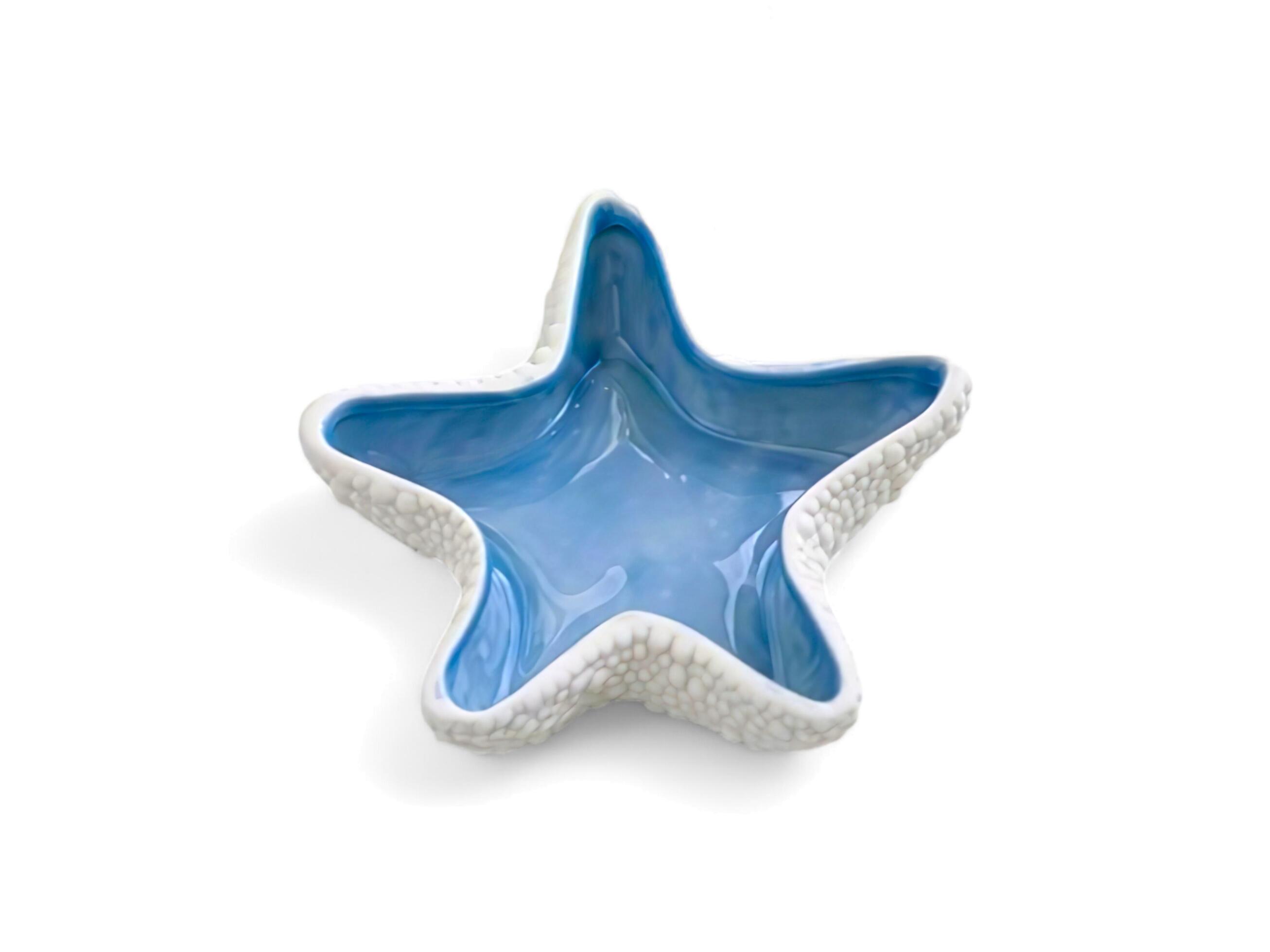 star-shaped ashtray on a white background Stock Free