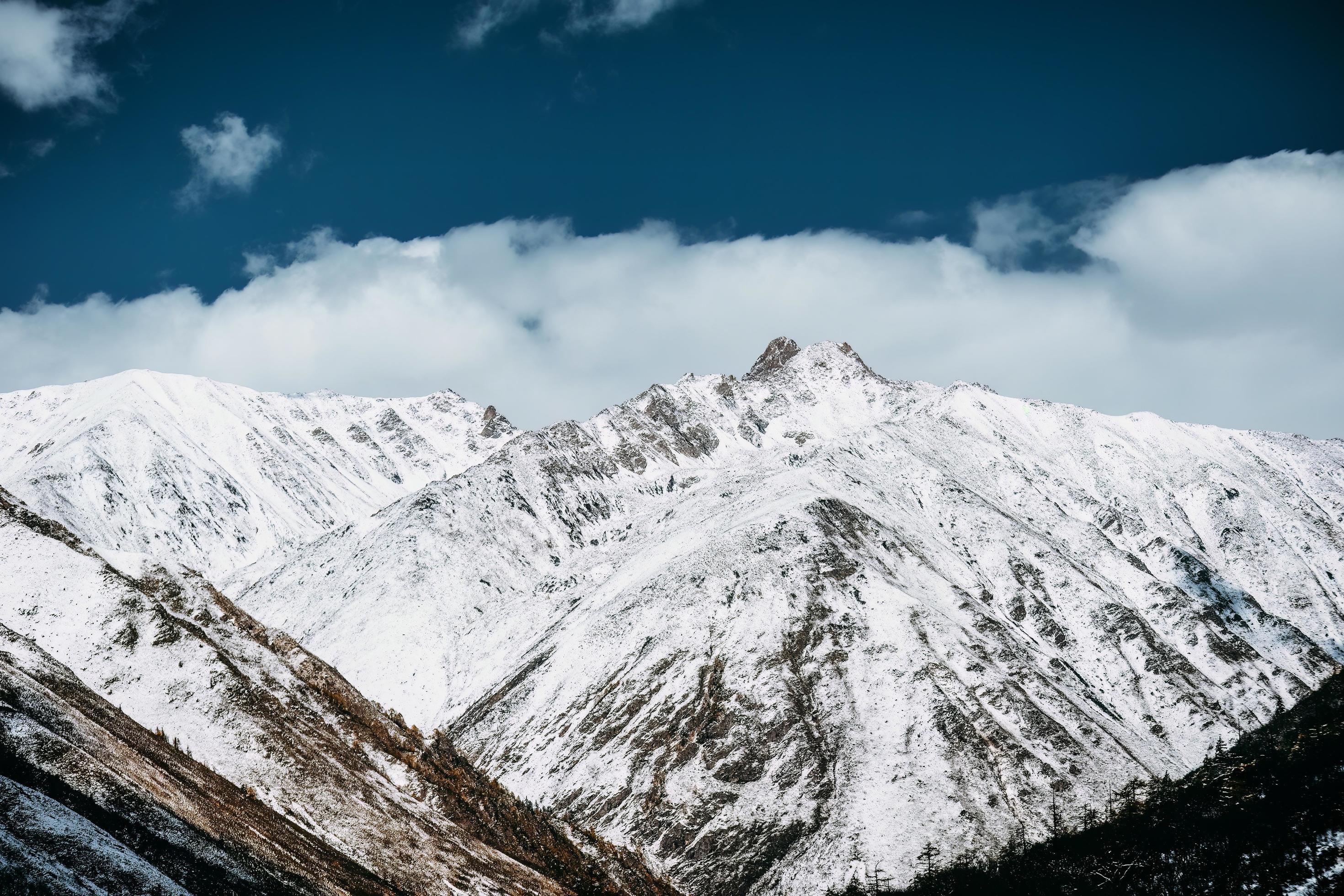 Spectacular scenery in the high mountains of western Sichuan, China, with different seasons Stock Free