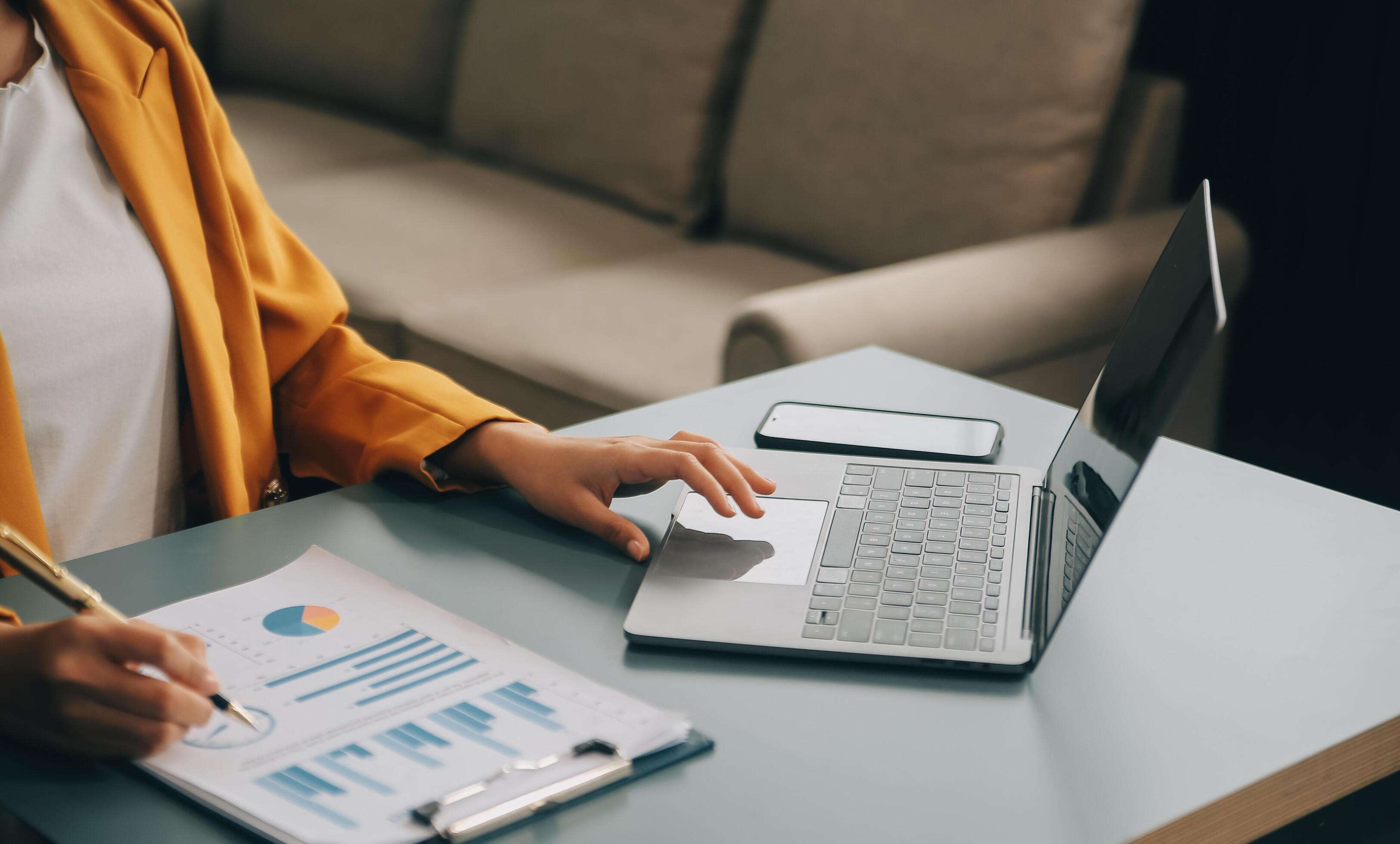 Portrait of a successful business woman using digital tablet Stock Free