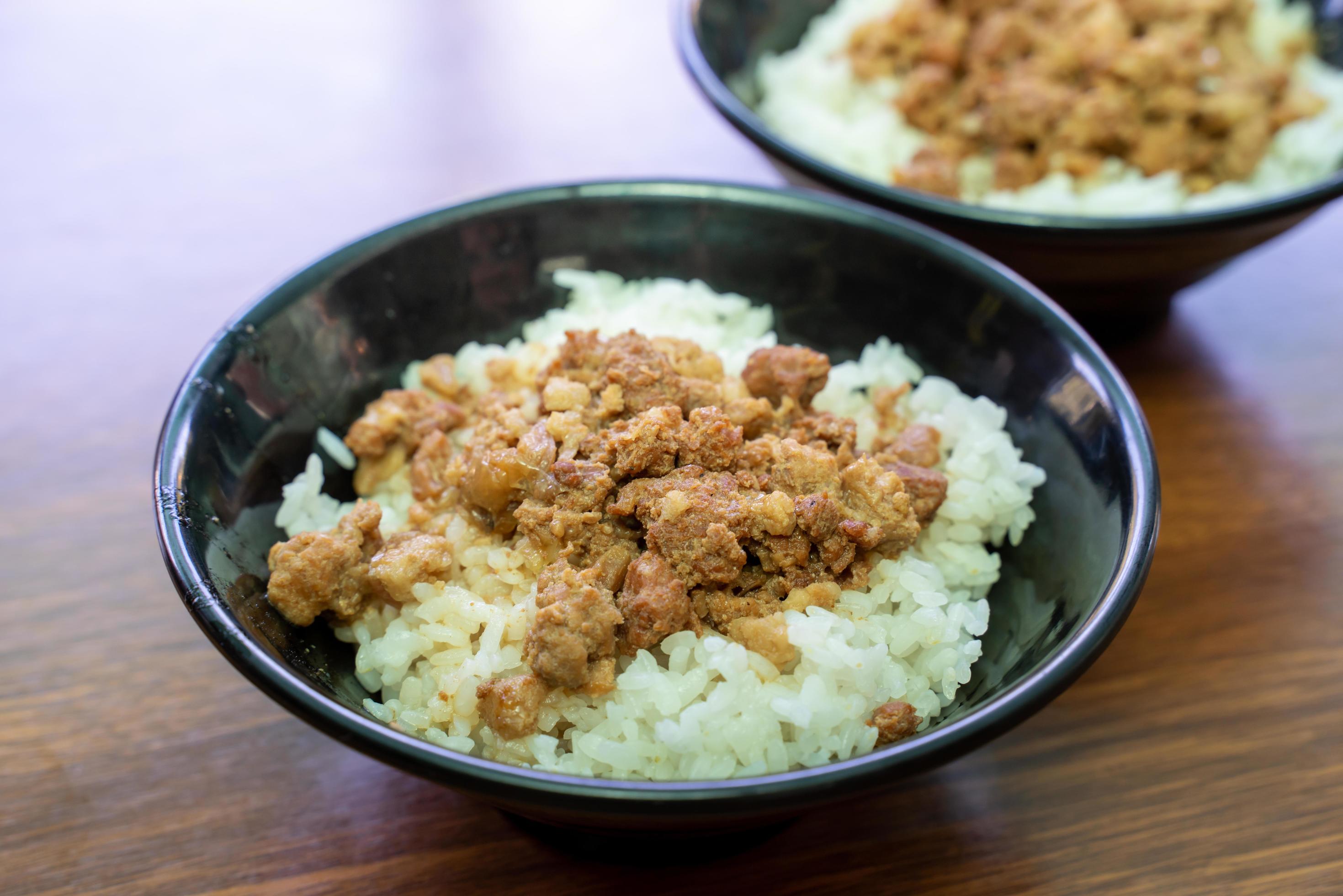 Braised meat over cooked rice, famous and delicious street food in Taiwan. Stock Free