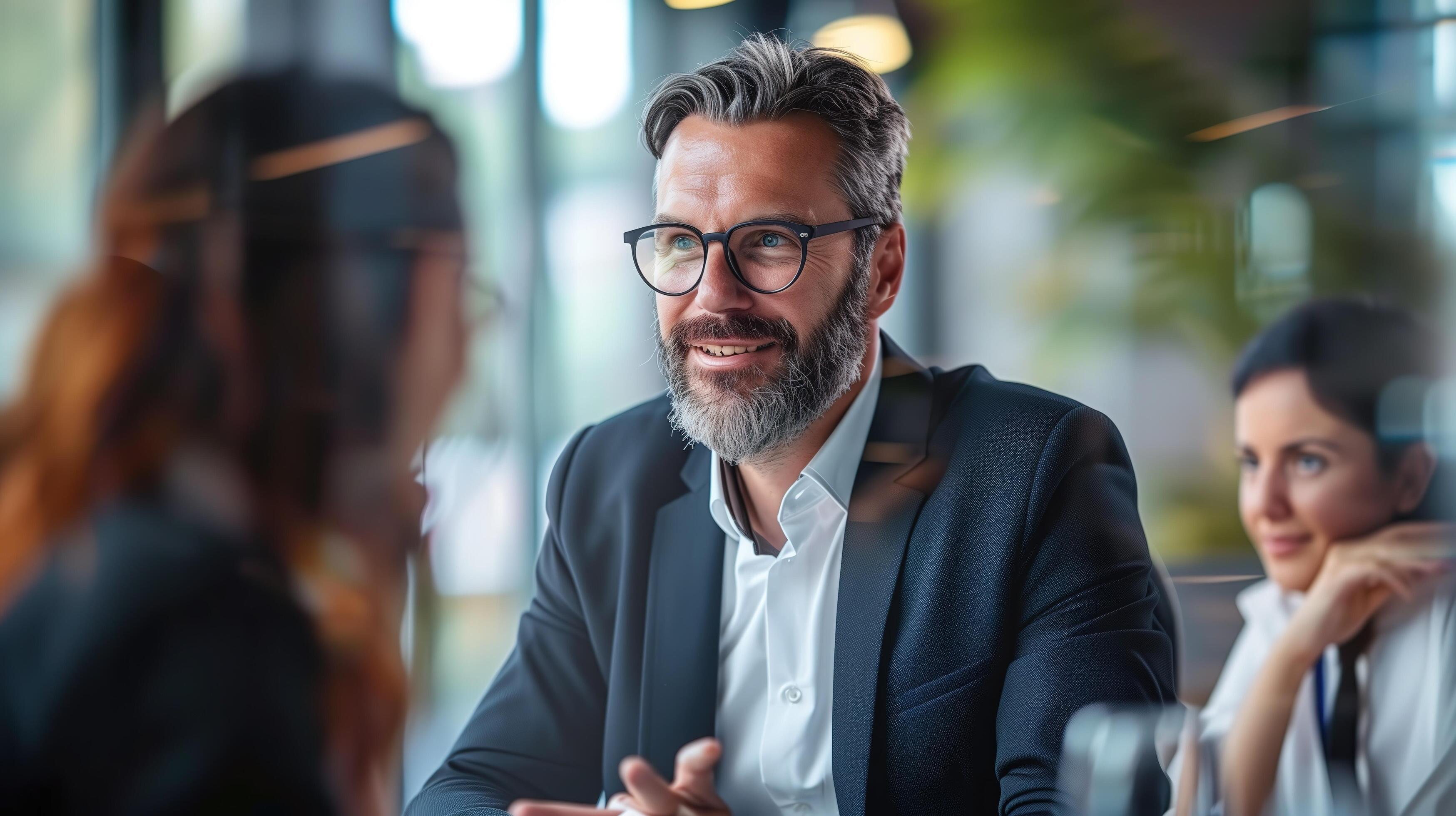 A confident financial advisor explaining investment options to attentive clients in a sleek, professional office environment Stock Free