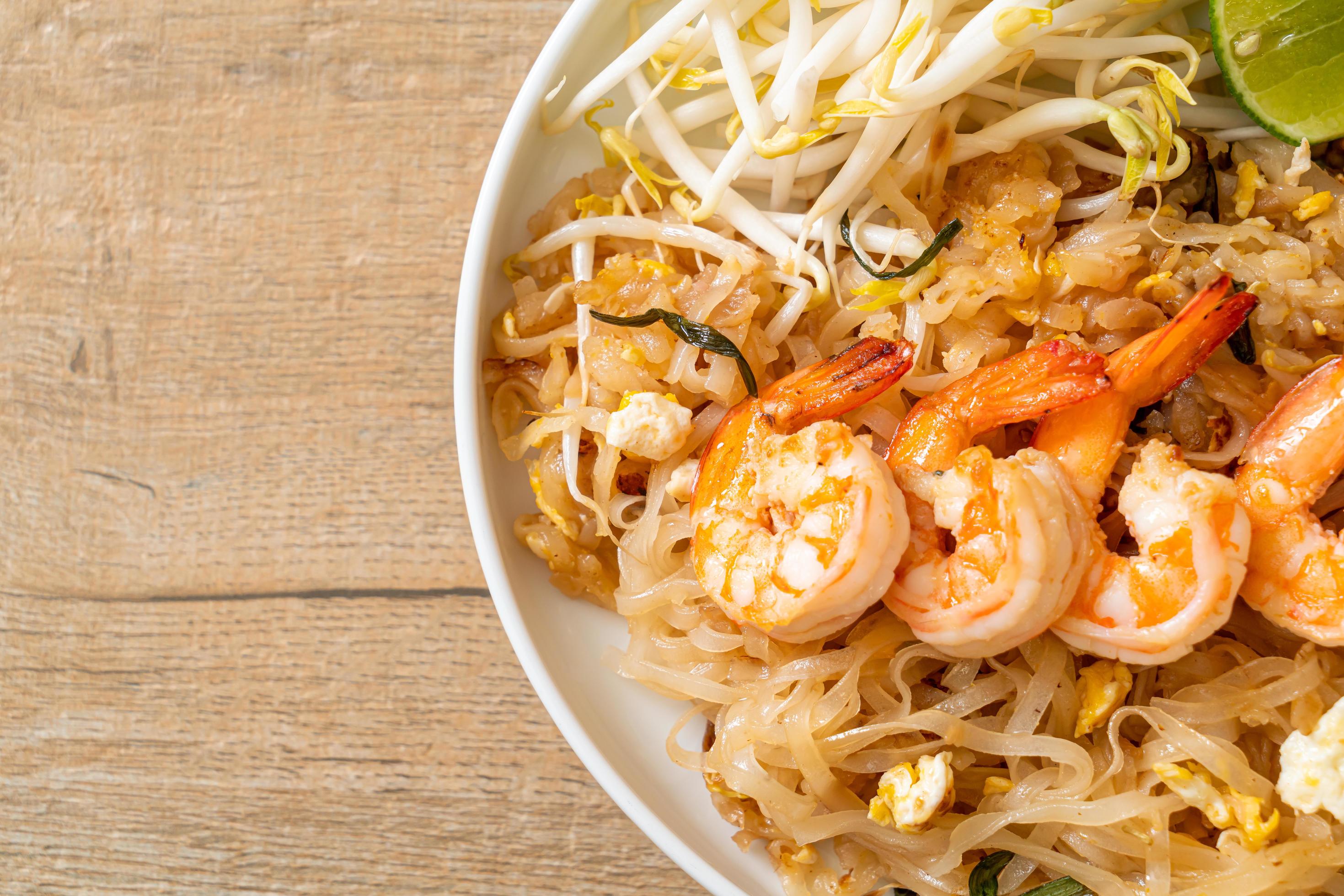 Stir-fried noodles with shrimp and sprouts or Pad Thai – Asian food style Stock Free