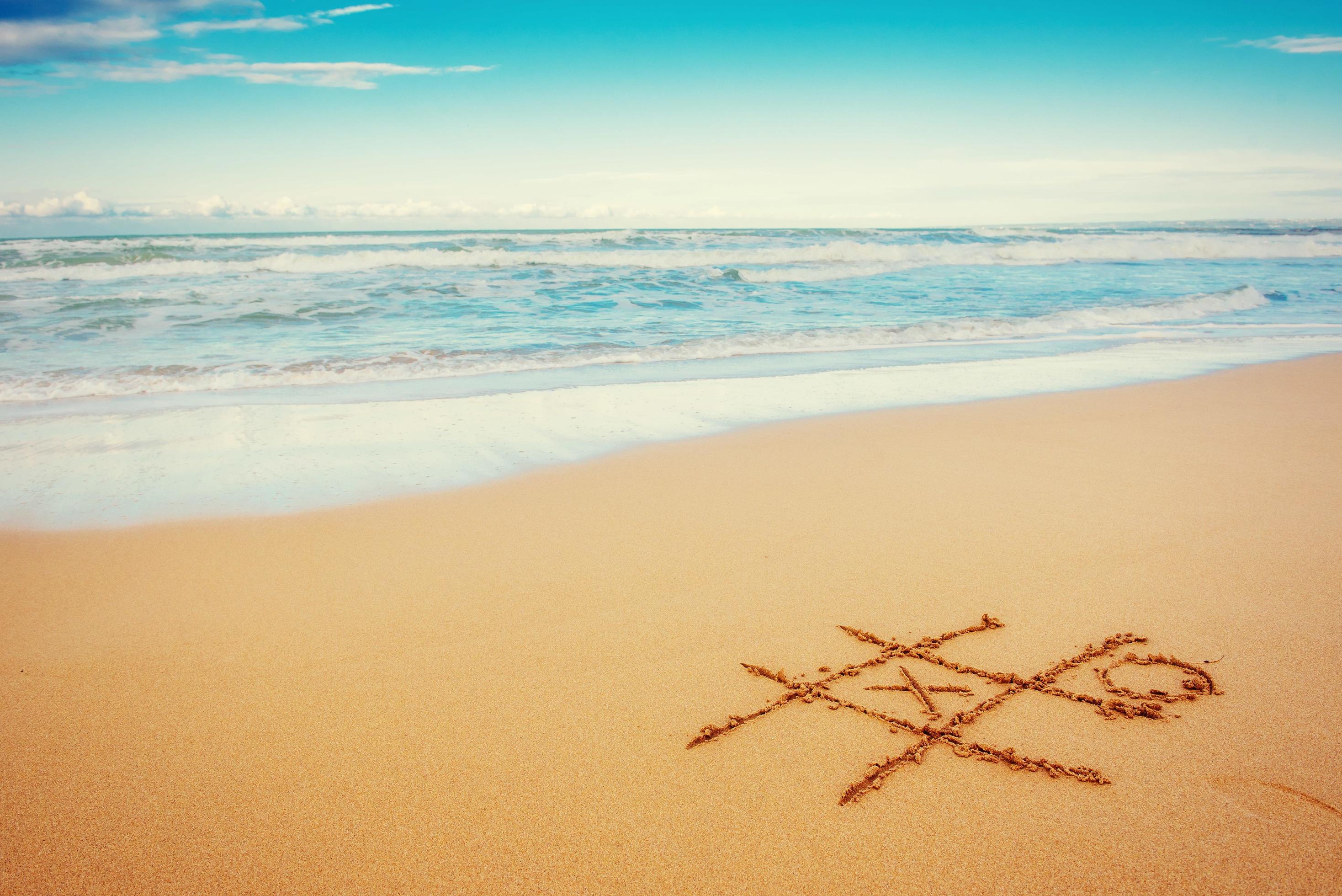 The drawings in the sand at the beach Stock Free