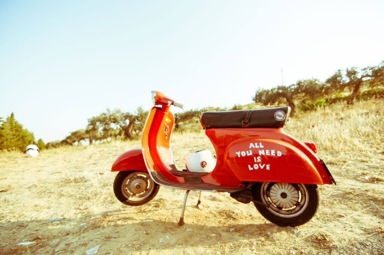 Vintage Red Vespa Beach Stock Free