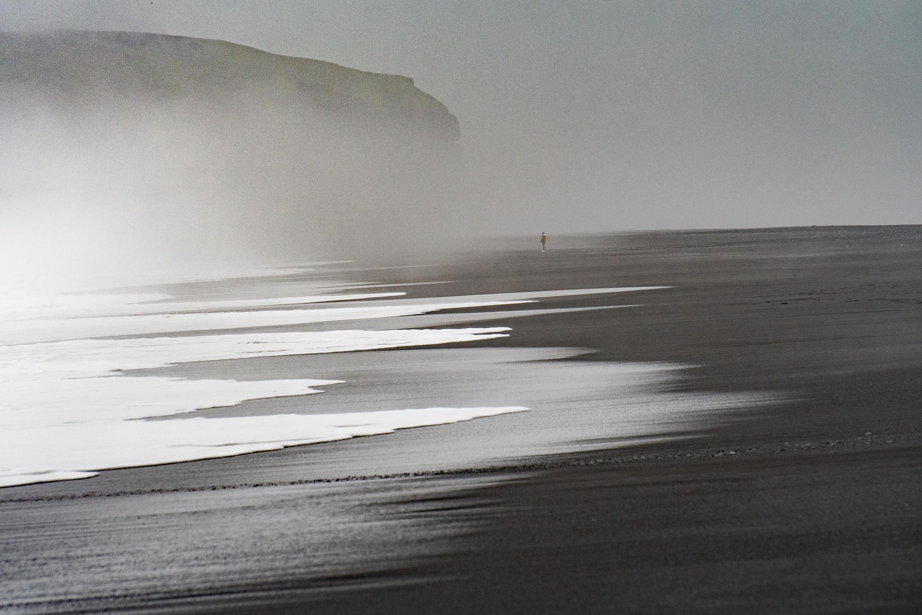 Black beach shore with fog Stock Free