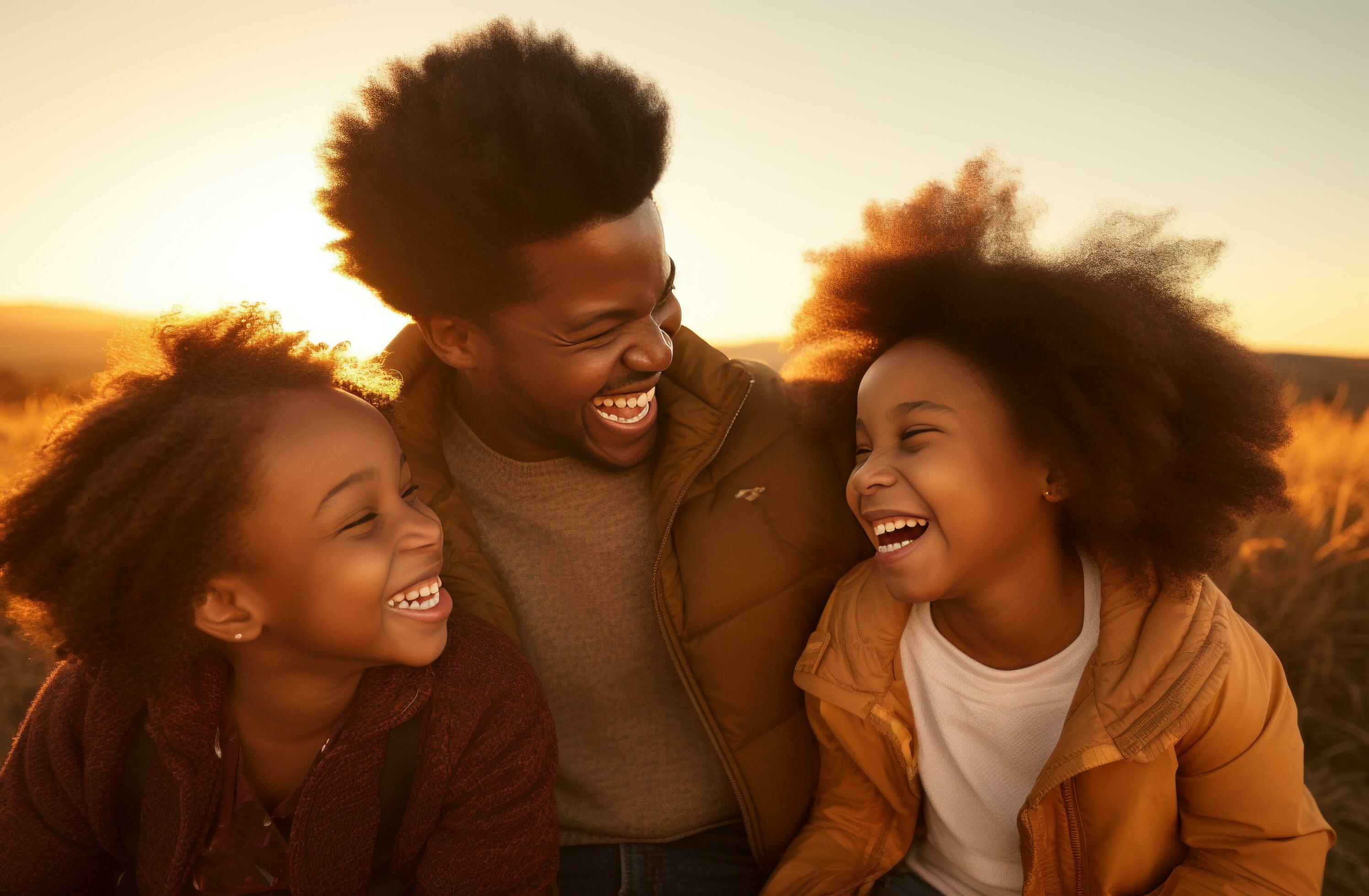 AI generated an african american family laughing together at sunset Stock Free