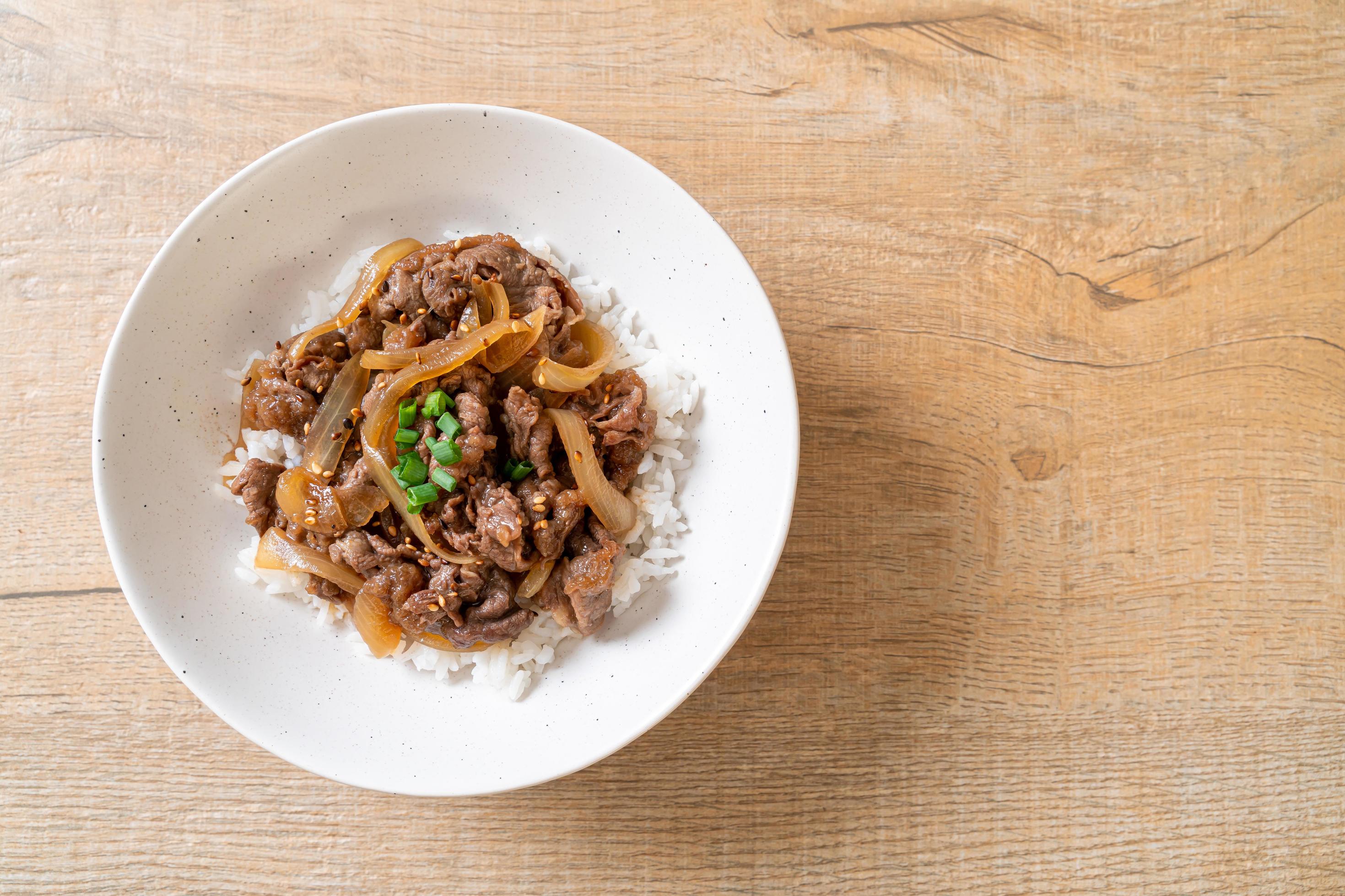 beef sliced on topped rice, or gyudon – Japanese food style Stock Free