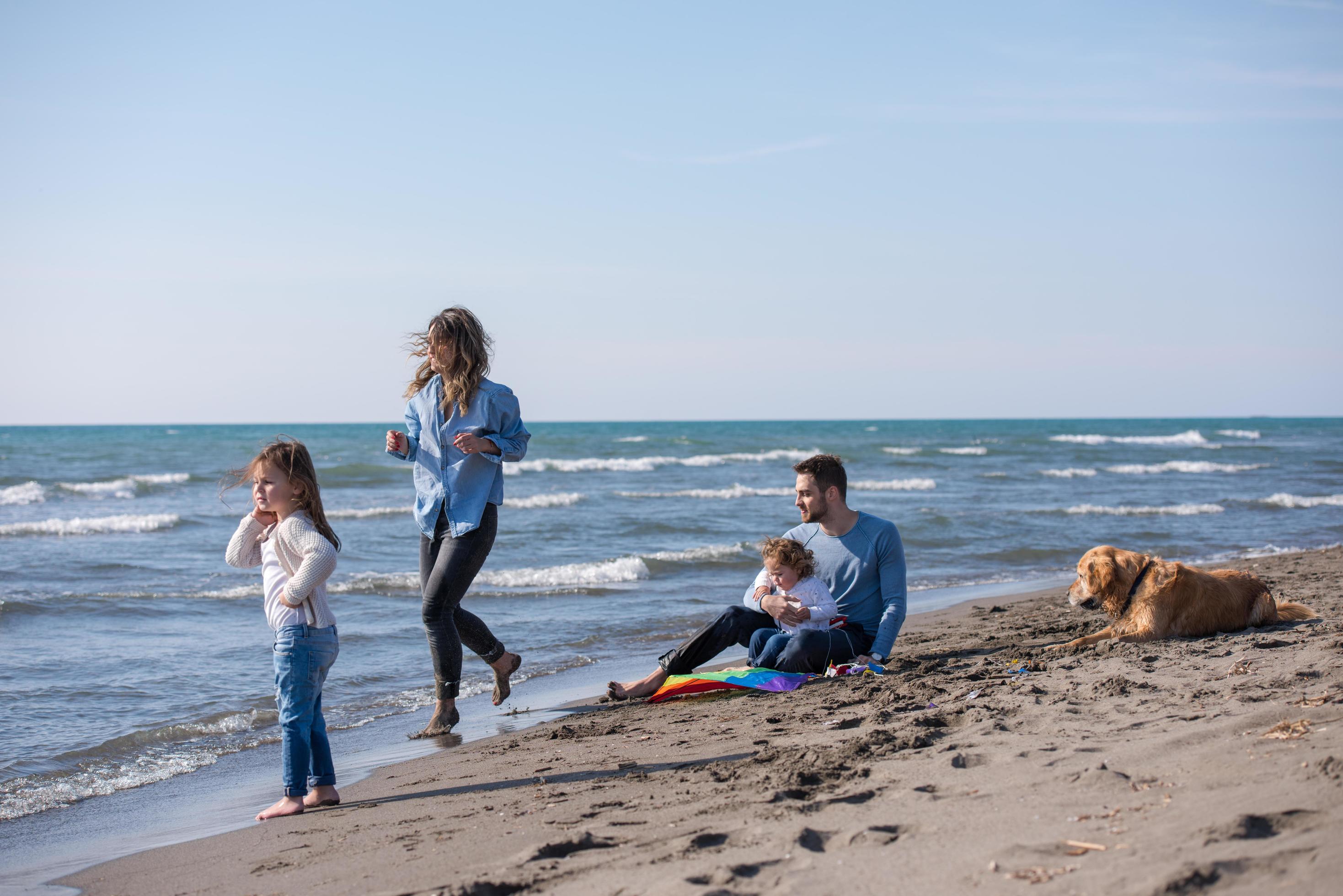 happy young family enjoying vecation during autumn day Stock Free