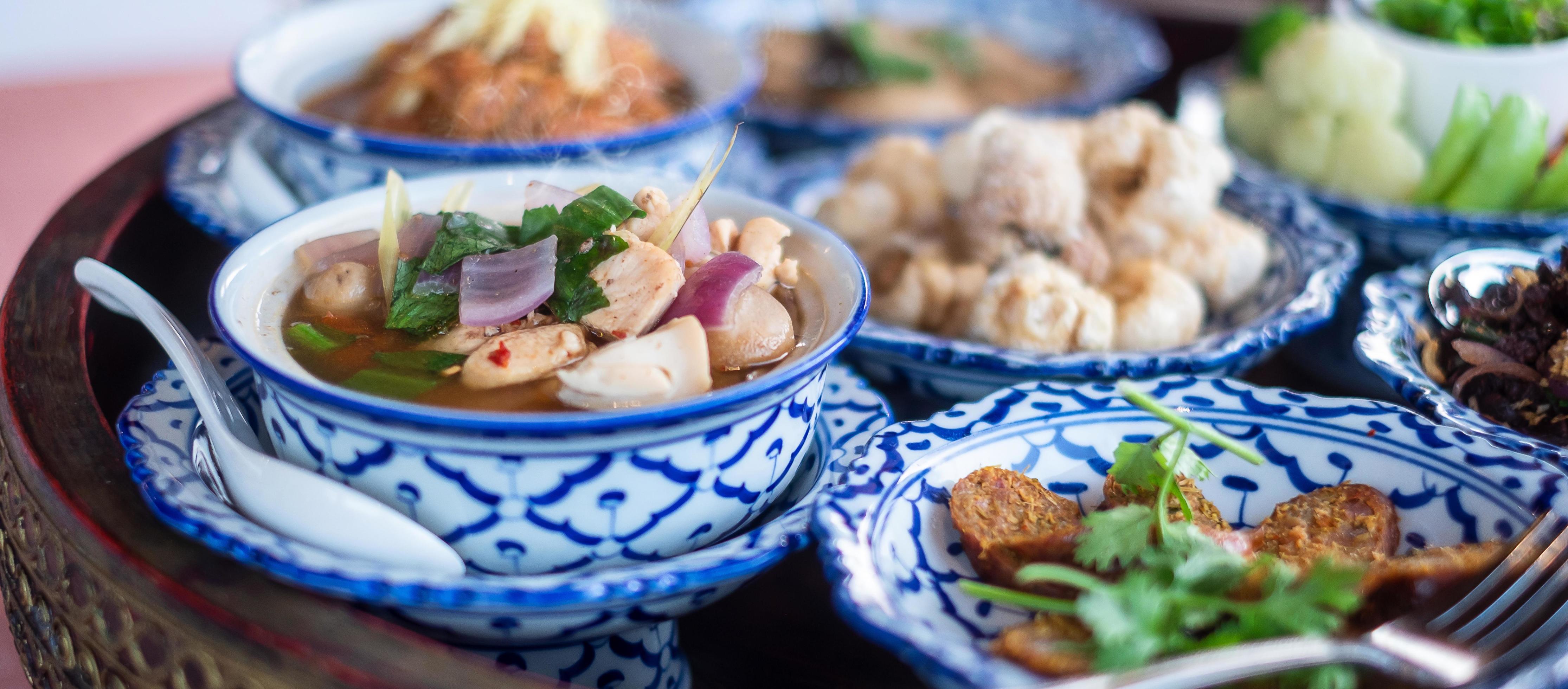 traditional Thai food on bamboo tray or Khan Toke, local food in Northern of Thailand Stock Free