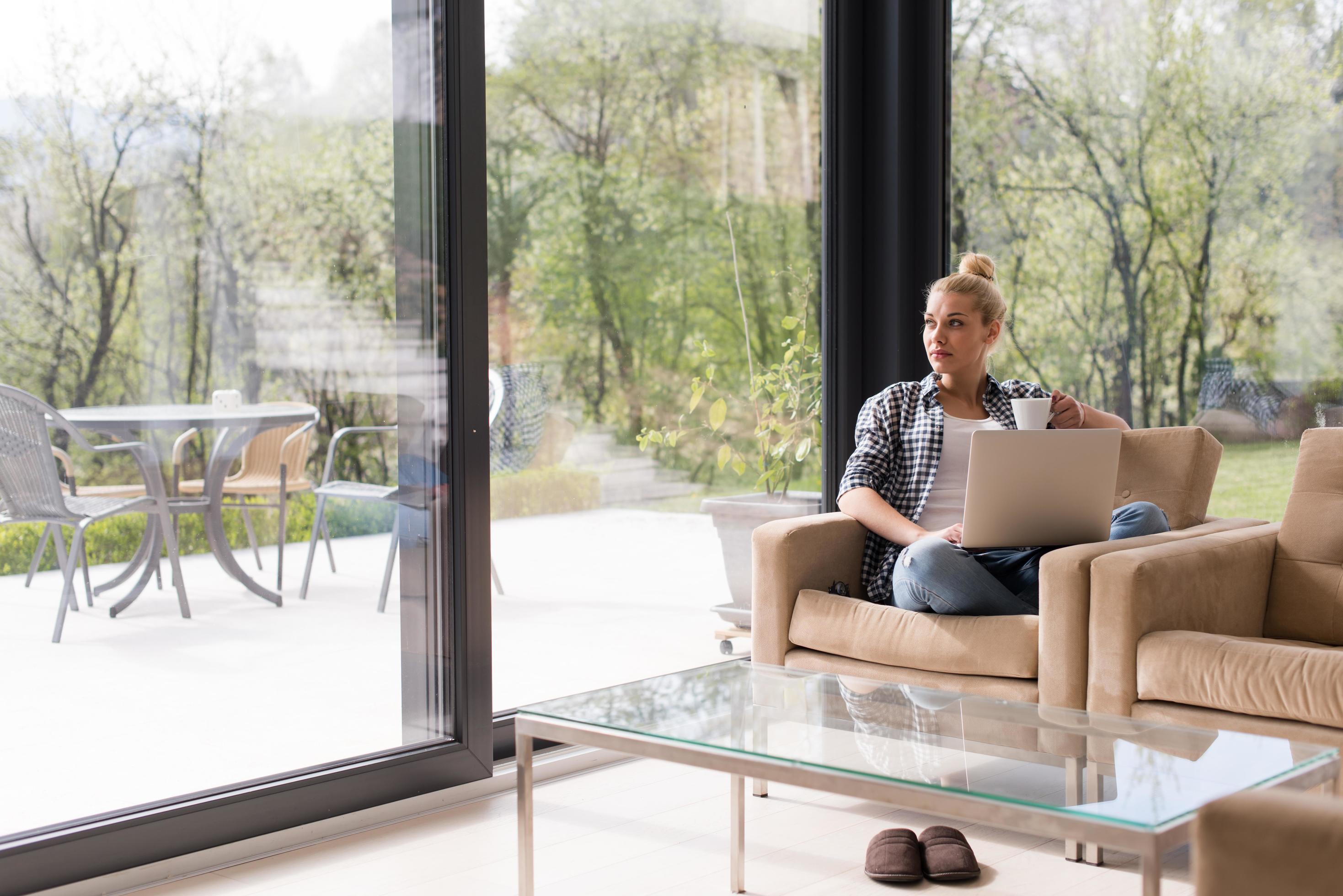 woman drinking coffee enjoying relaxing lifestyle Stock Free