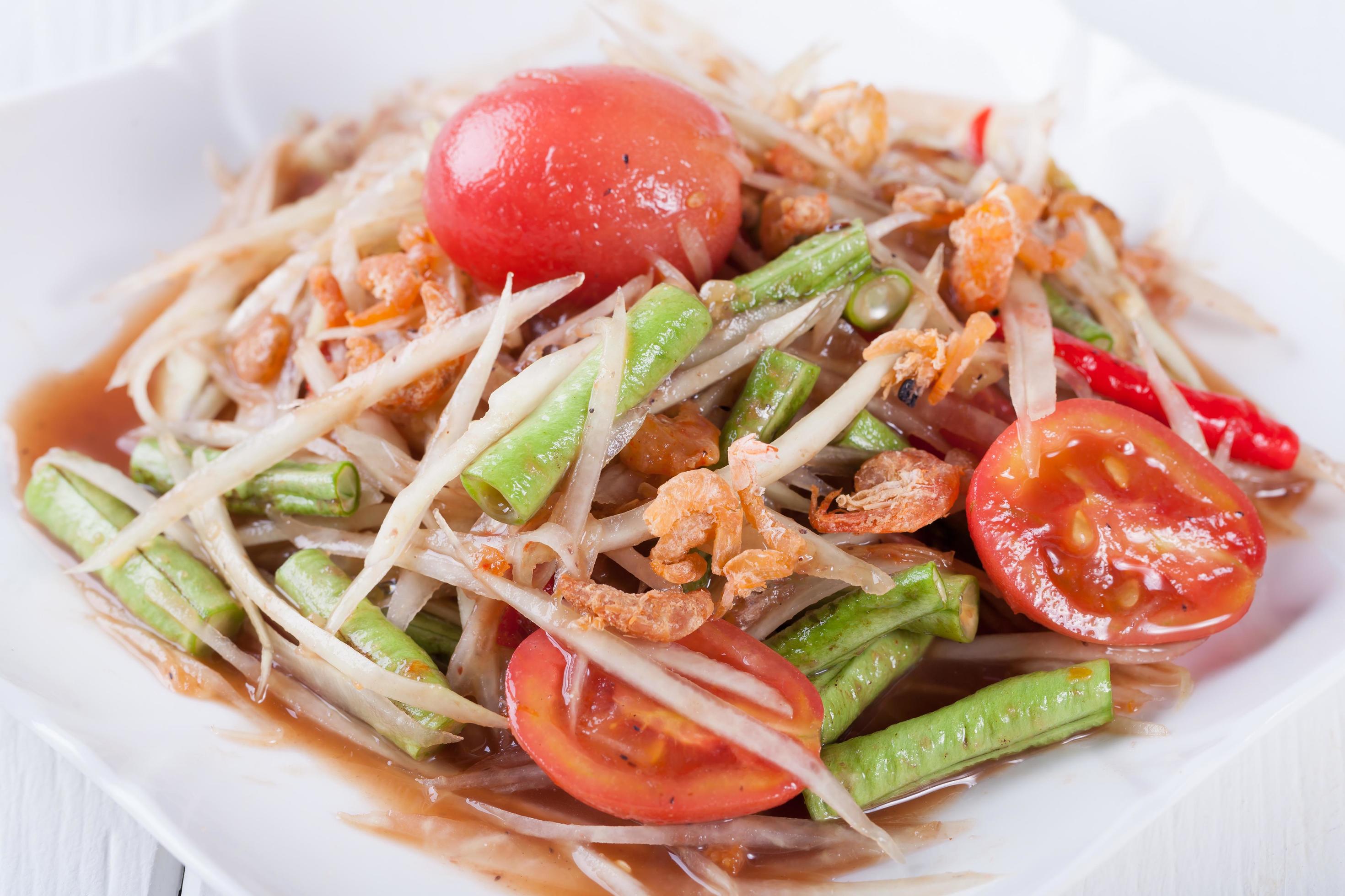 Somtum, papaya salad delicious food in thailand Stock Free