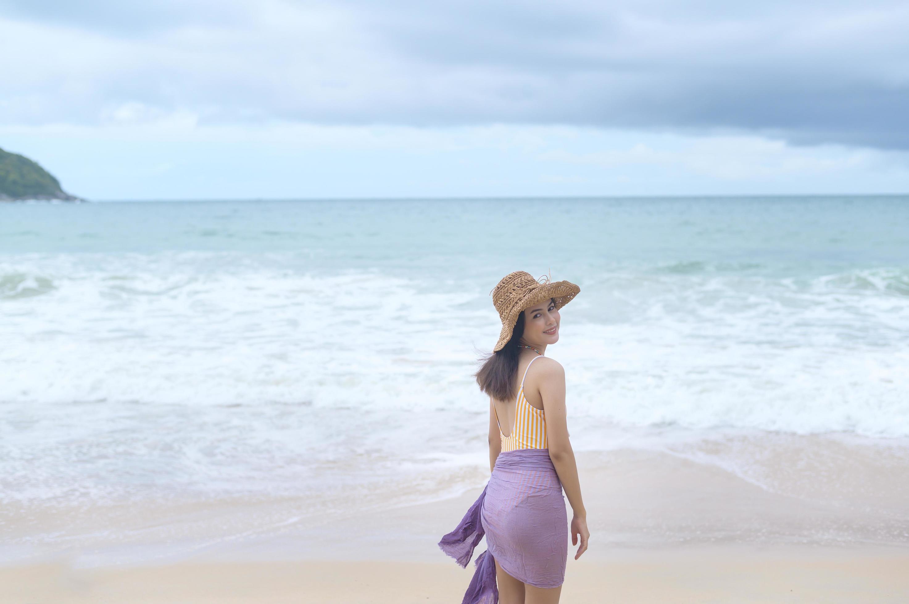 Young Beautiful woman in Bikini enjoying and relaxing on the beach, Summer, vacation, holidays, Lifestyles concept. Stock Free