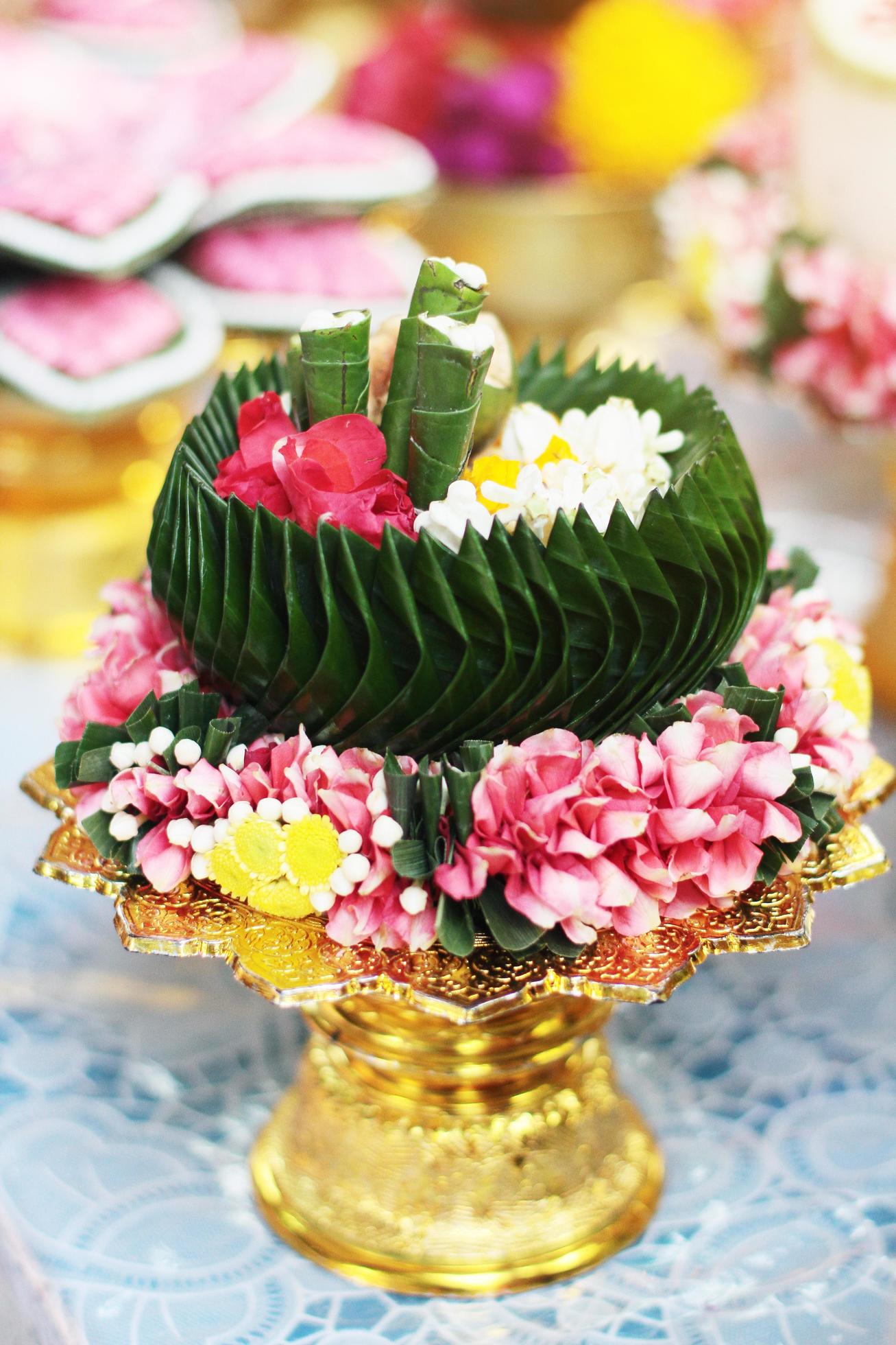 Beautiful flowers decoration on Engagement gold bowl for Thai engagement ceremony.Thai wedding culture tradition Stock Free