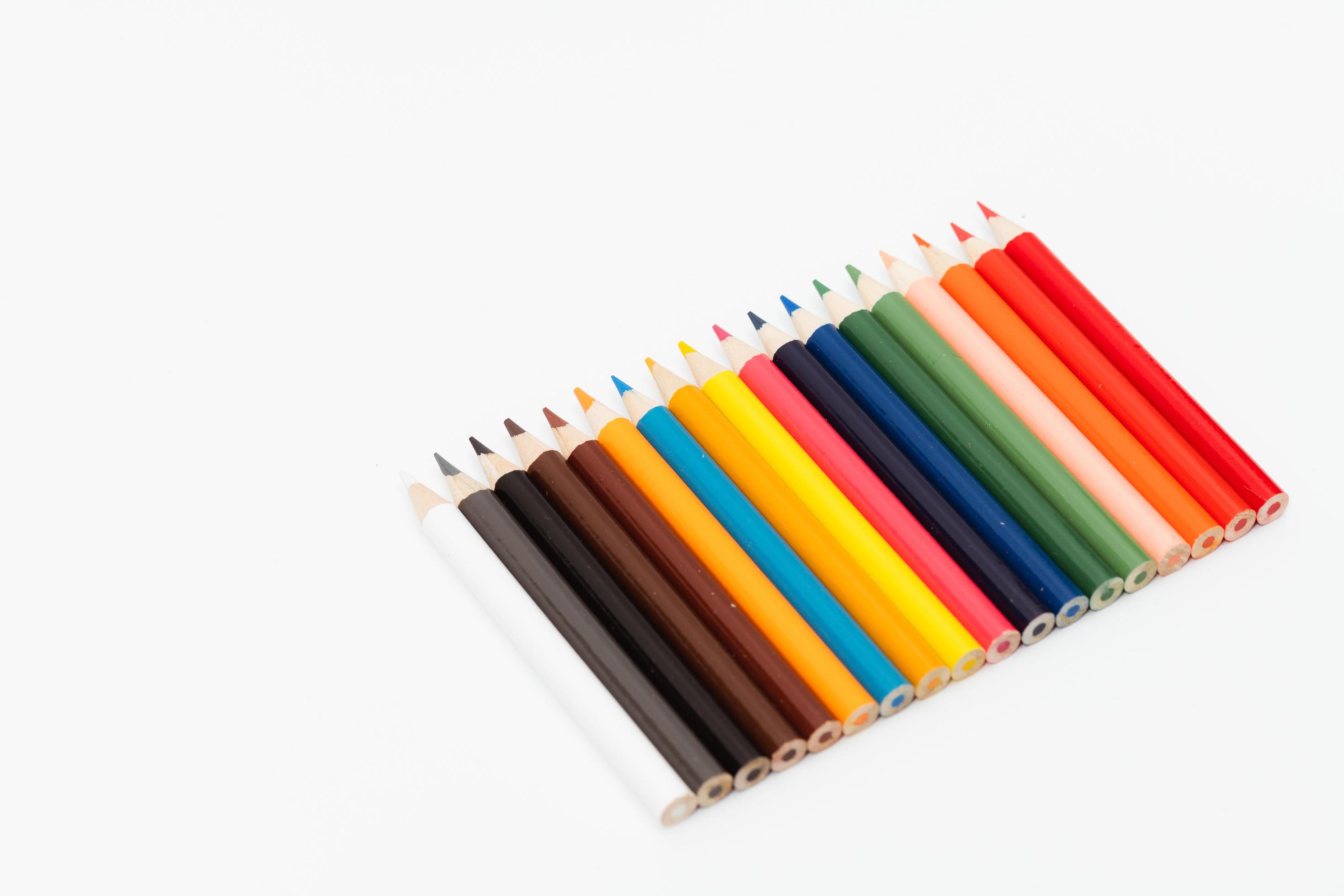 Multi color pencils. the concept of a multinational family and equality in the world. Stock Free