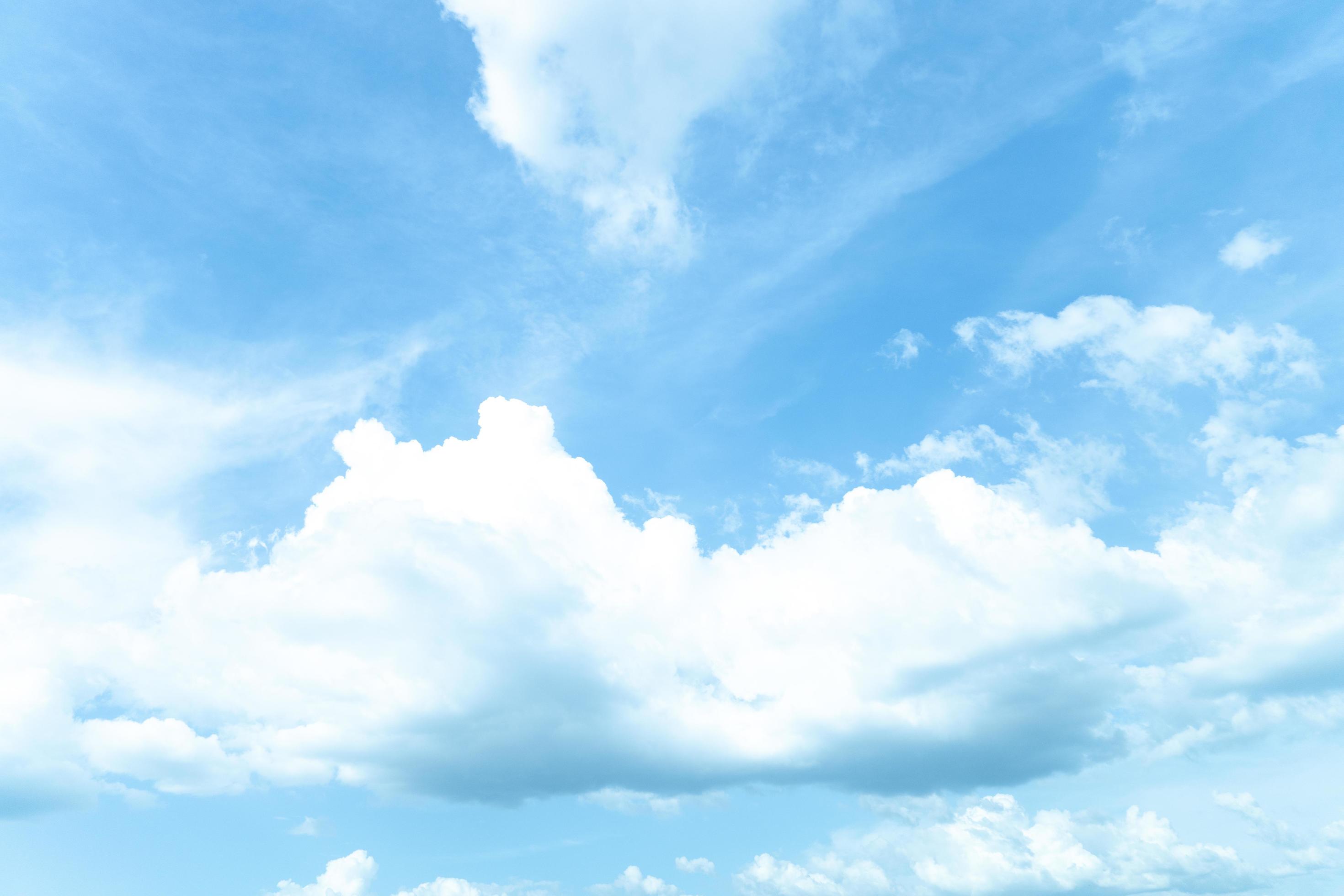 Abstract of clear blue sky with clouds swaying in the wind. Background nature of the sky. Stock Free