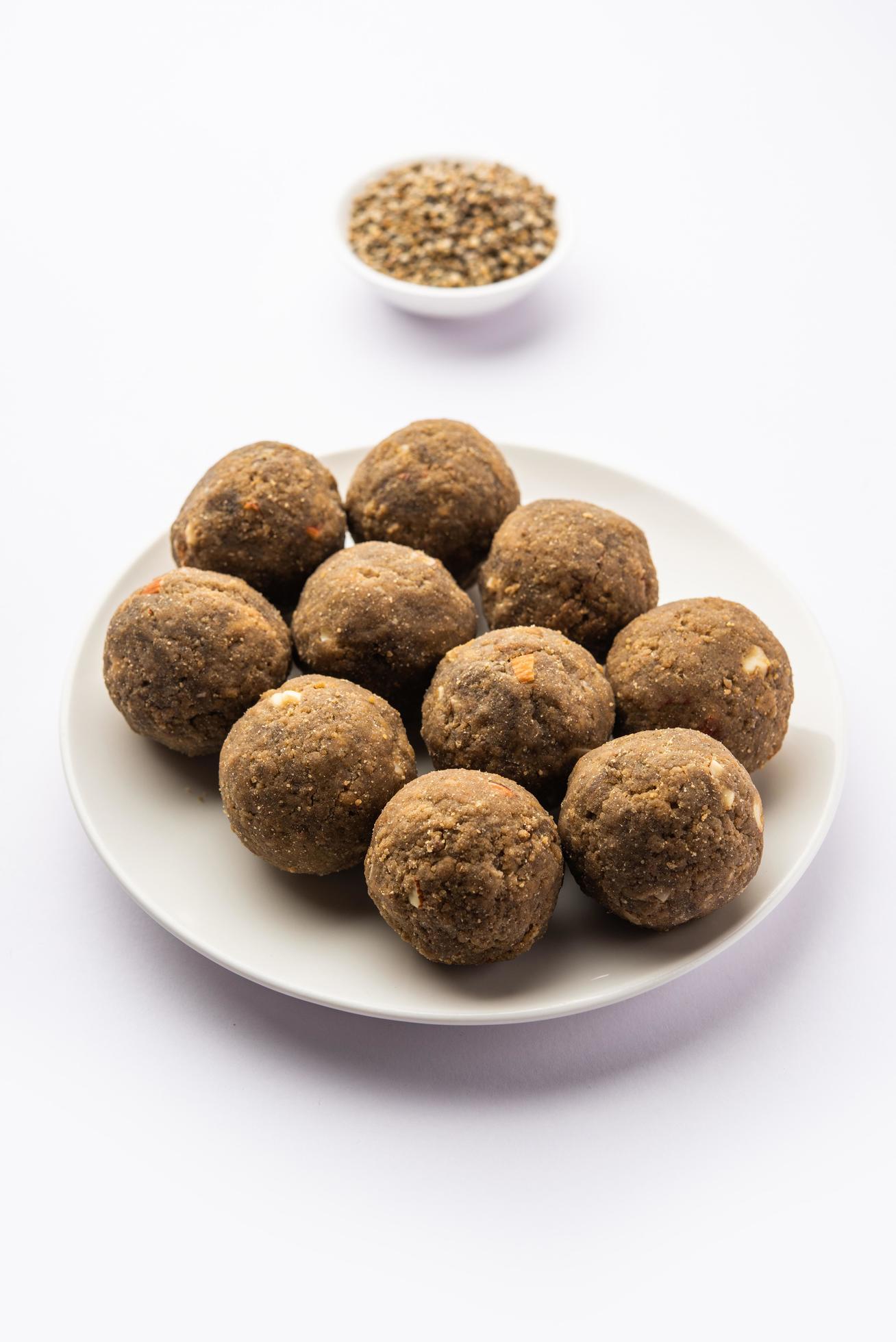 Bajra Atta Ladoo or kuler laddoo – Millet Flour Laddu, a popular winter sweet snack food from India Stock Free