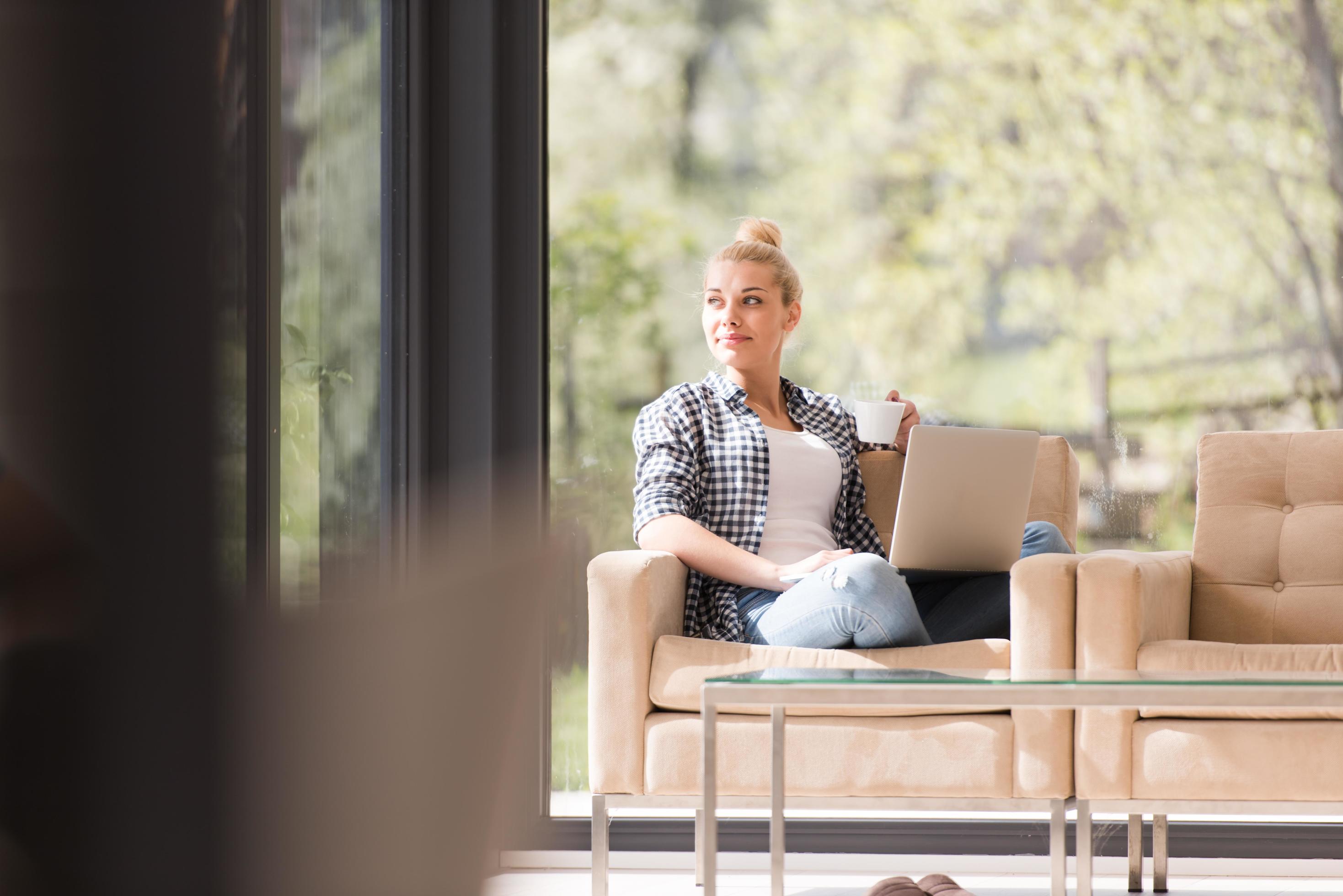 woman drinking coffee enjoying relaxing lifestyle Stock Free