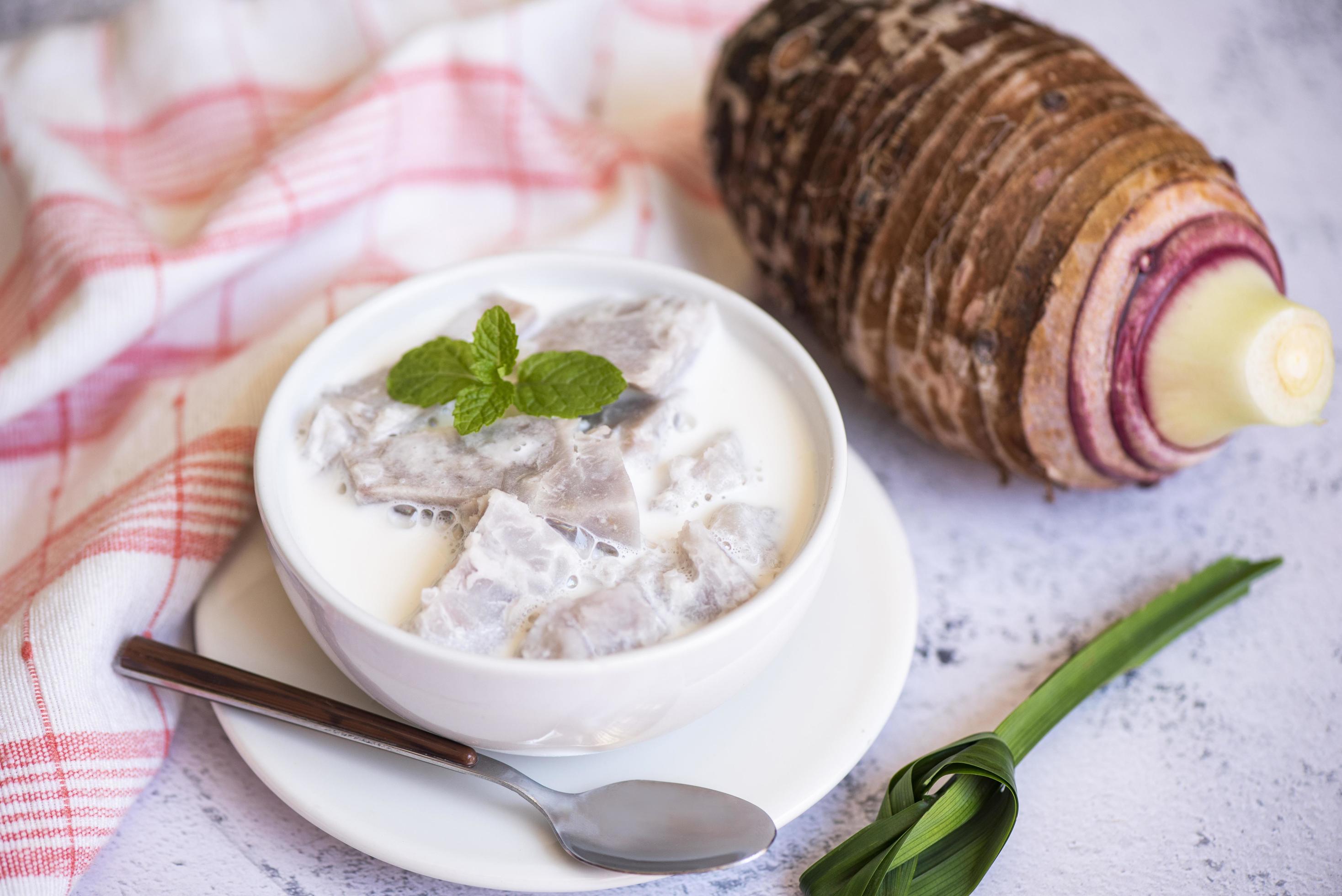 Taro food with dessert taro boiled with sugar and coconut milk on bowl and fresh raw organic taro root ready to cook, Asian Thai food Stock Free