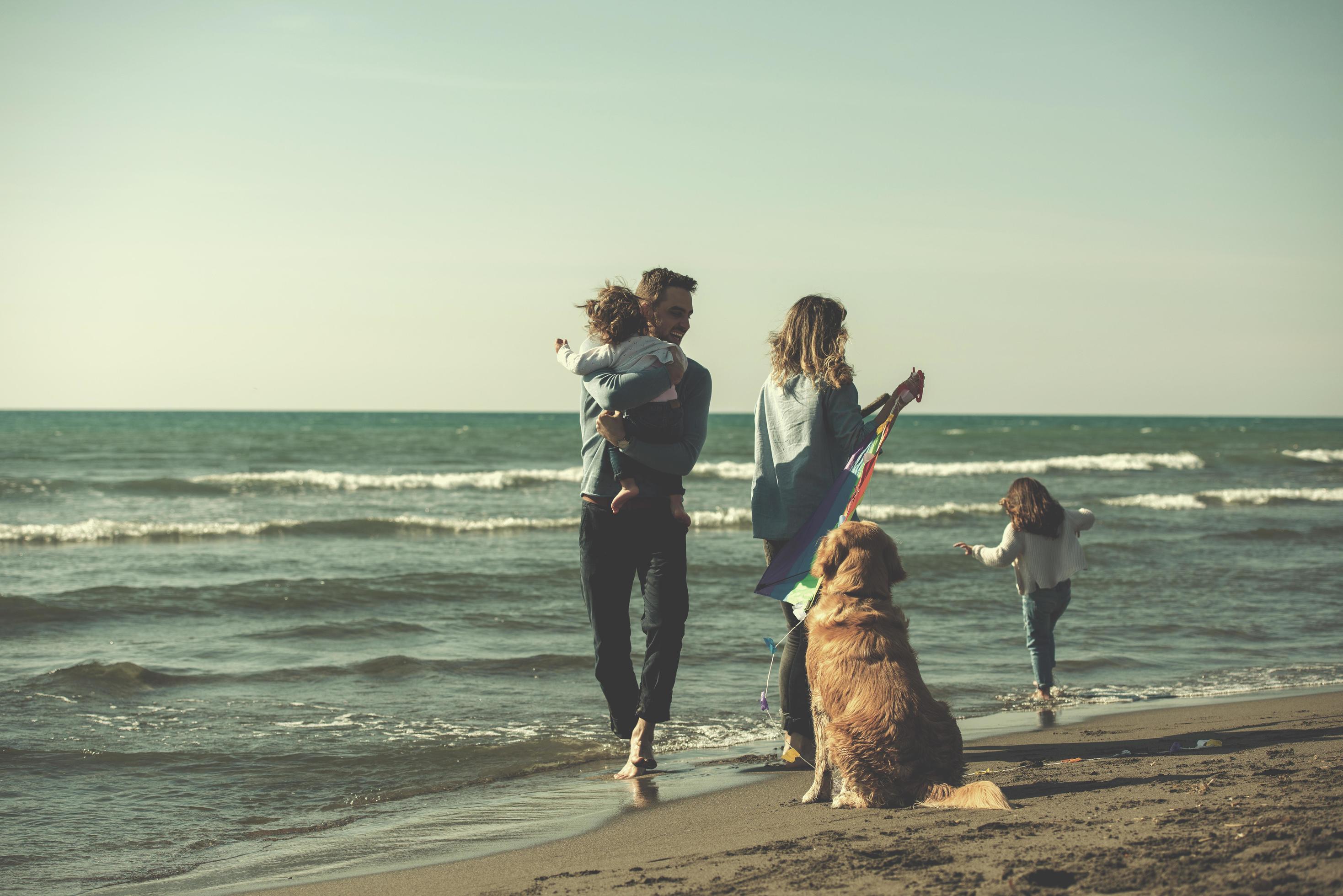 happy young family enjoying vecation during autumn day Stock Free