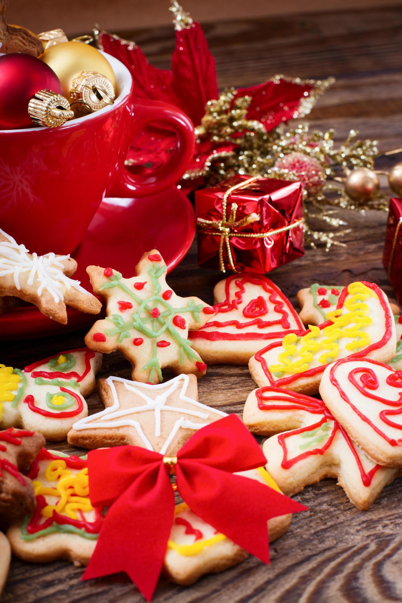 Knar and christmas food sweet cookies on wooden table background. Copy space. Selective focus. Happy new year concept. Stock Free