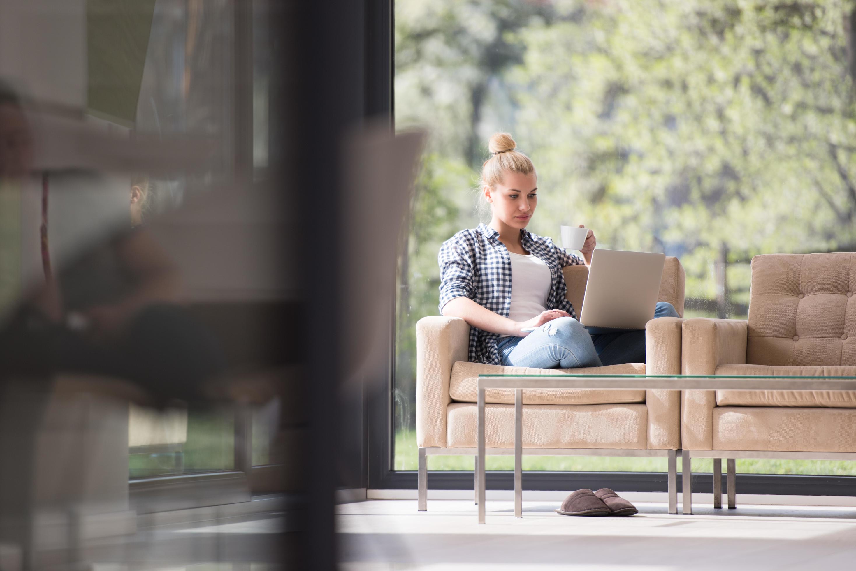 woman drinking coffee enjoying relaxing lifestyle Stock Free