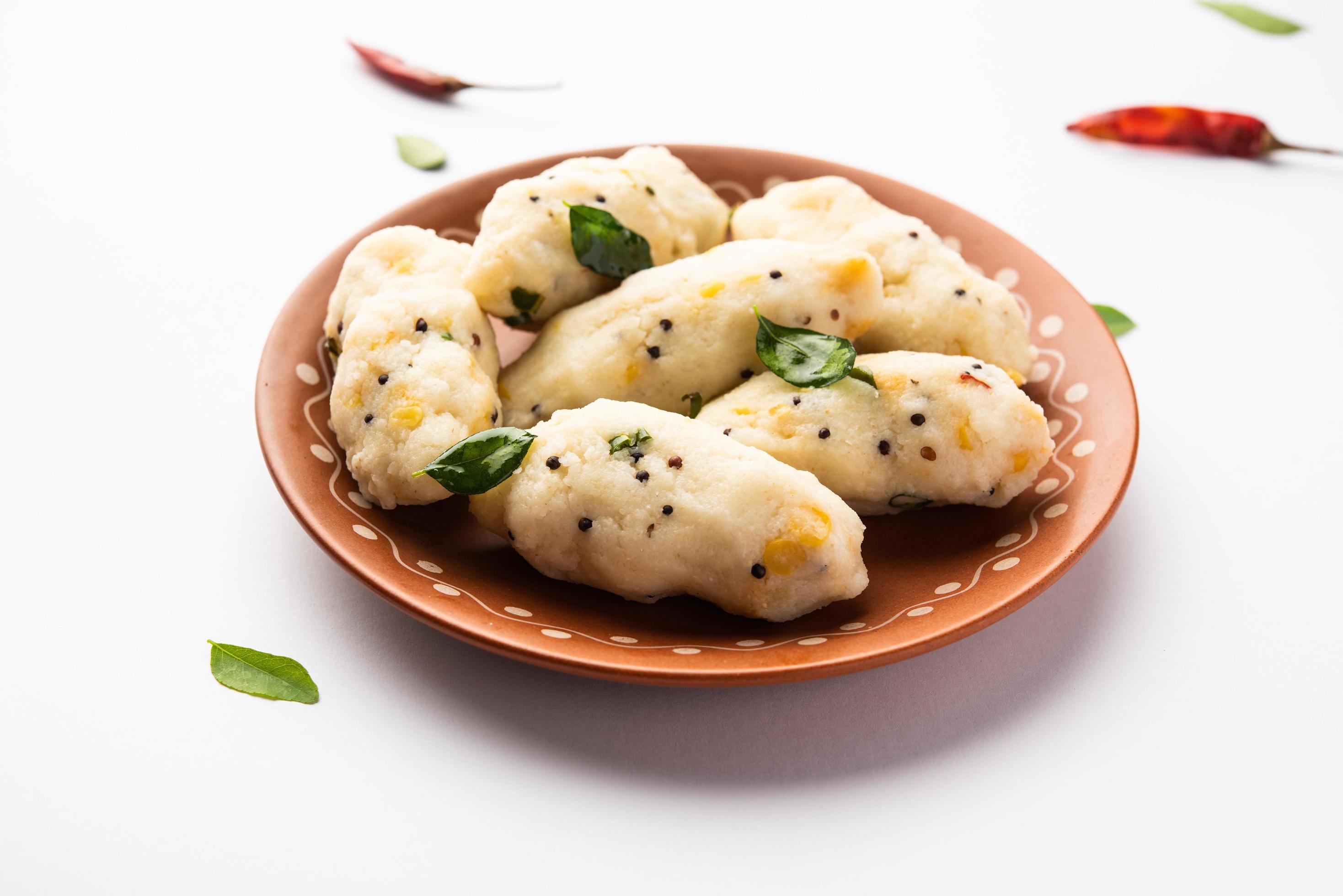 Kozhukatta Pidi is a steamed snack food from kerala rice flour with finger impressions Stock Free