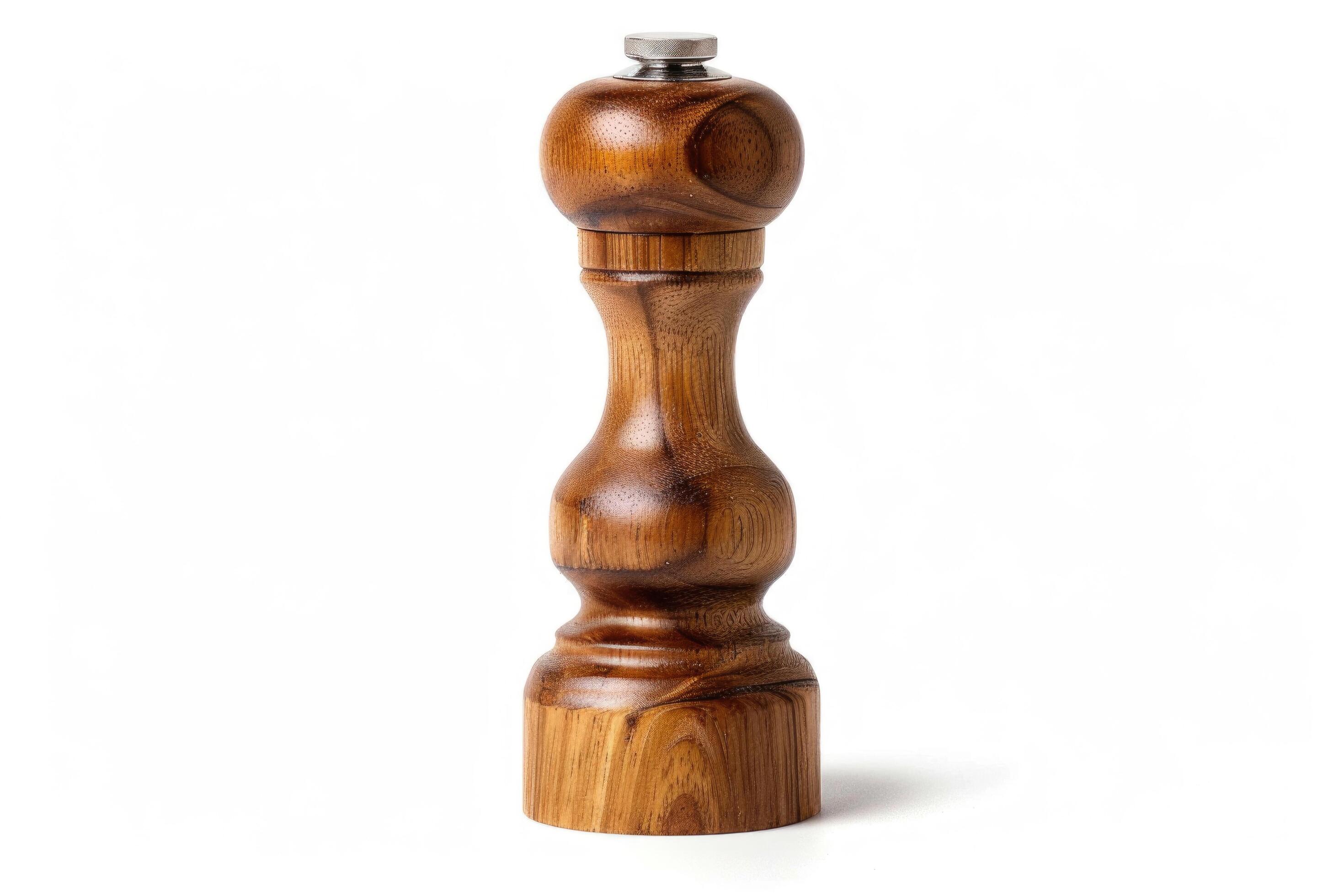 Wooden pepper mill on a white background. Stock Free