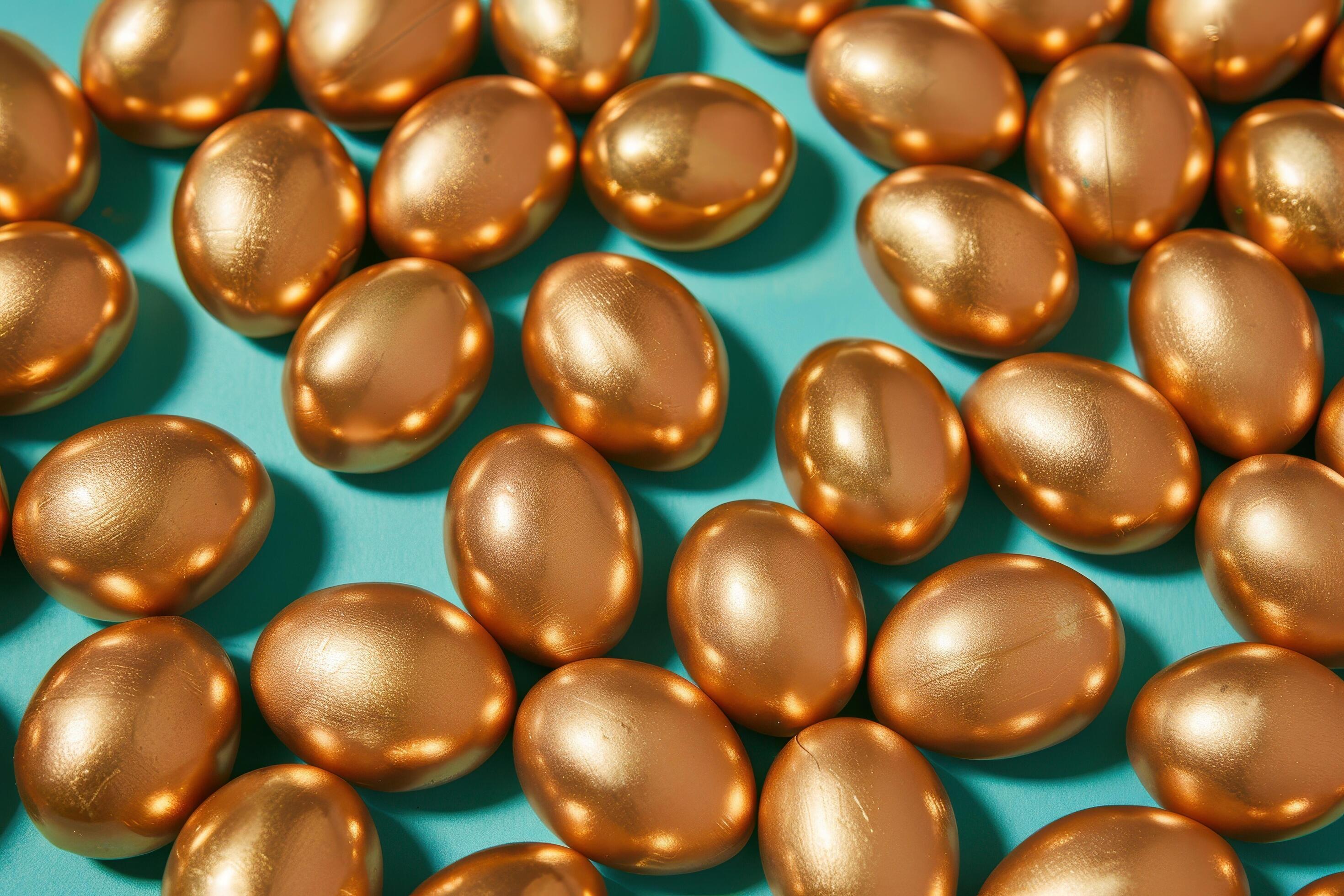 Golden Eggs Arranged on a Blue Background Stock Free