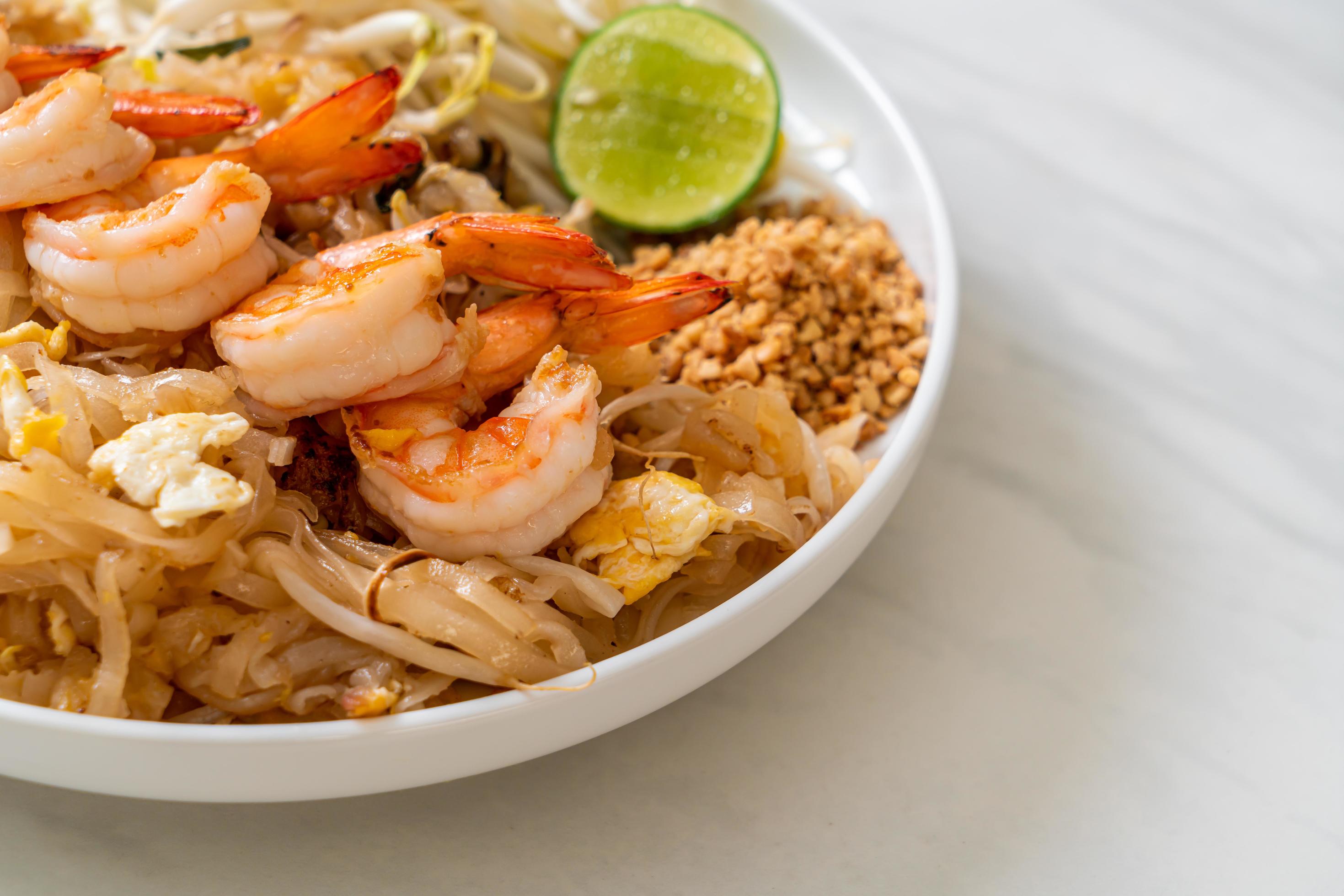 Stir-fried noodles with shrimp and sprouts or Pad Thai – Asian food style Stock Free