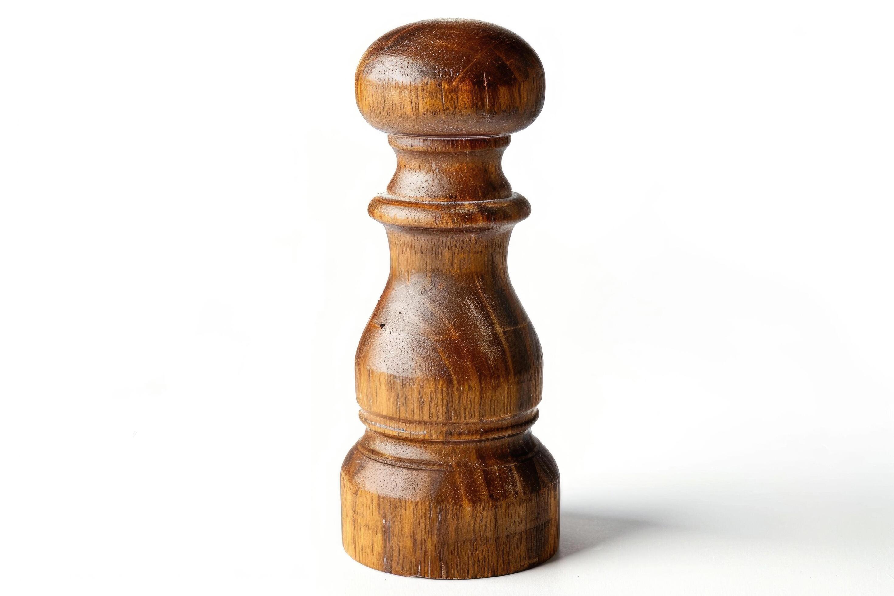 Wooden pepper mill on a white background. Stock Free