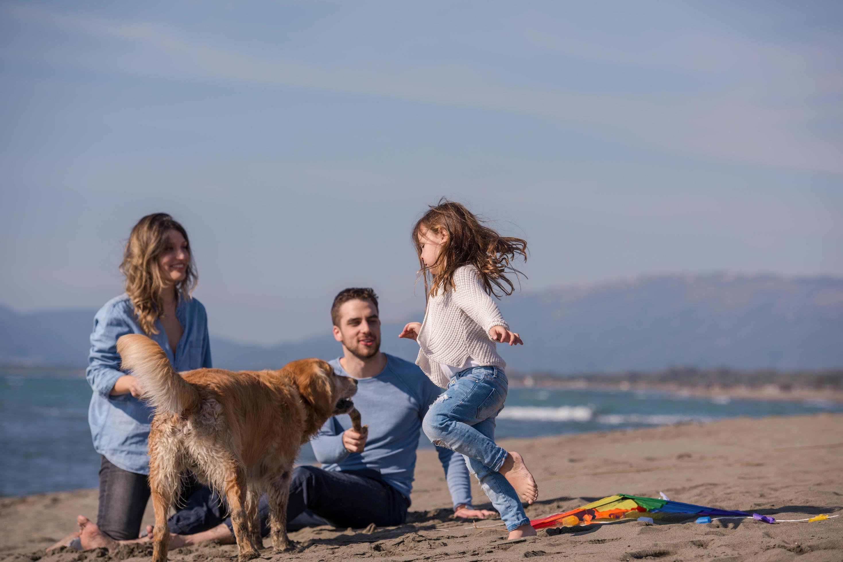 happy young family enjoying vecation during autumn day Stock Free