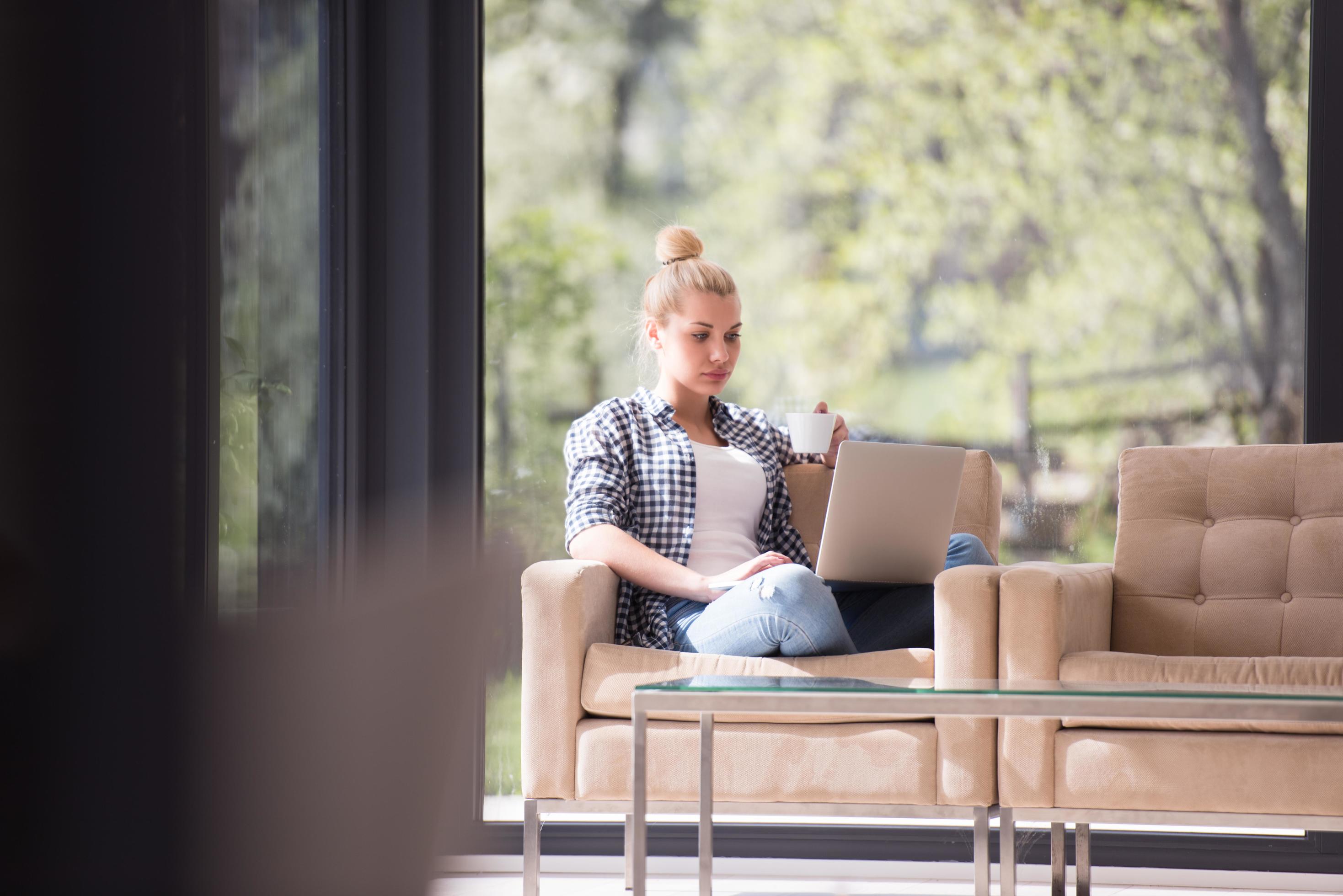 woman drinking coffee enjoying relaxing lifestyle Stock Free