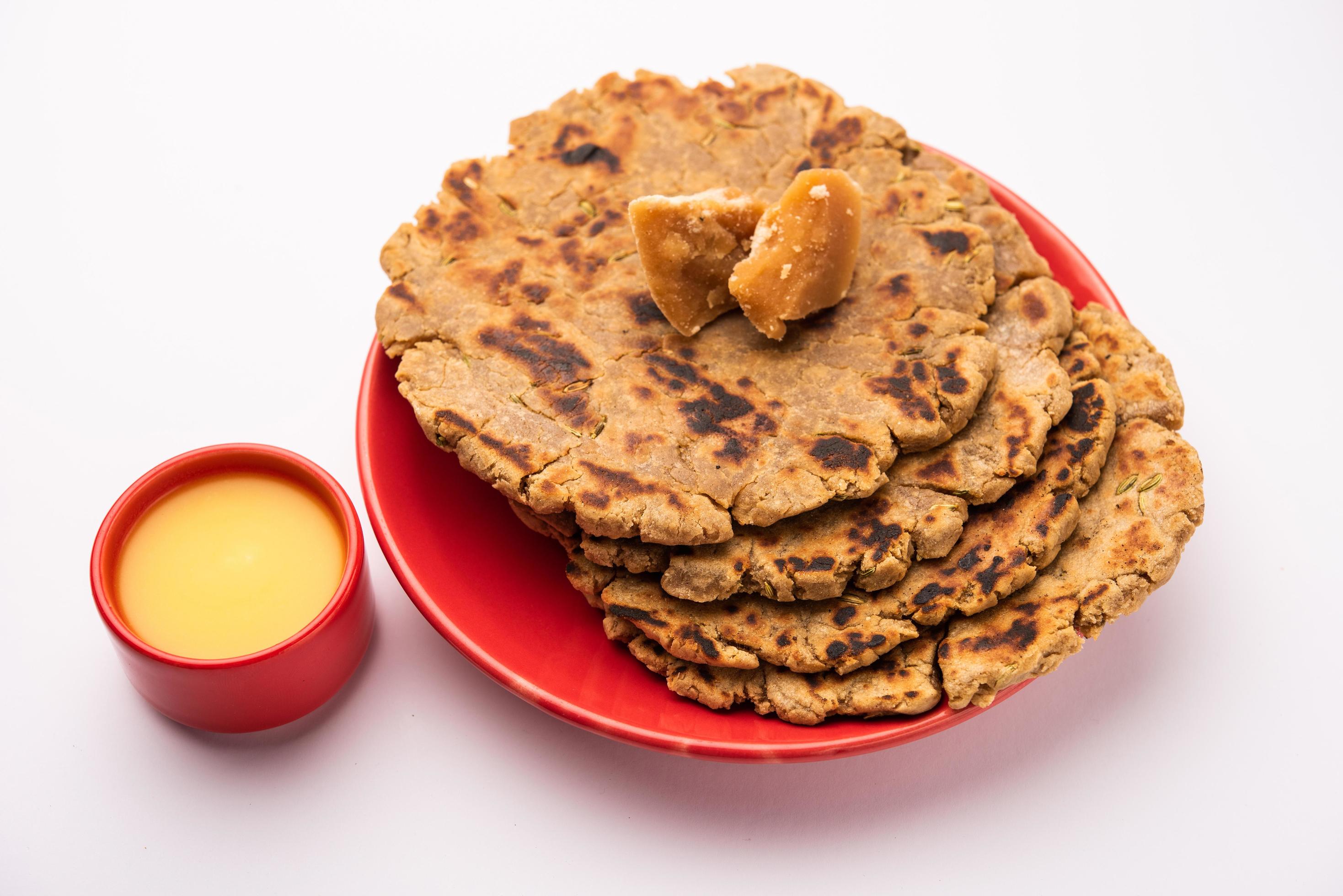 Sweet roti made out of rice flour, jaggery, and ghee. Gud ki roti. gur ki roti, jaggery Bhakri, meethi gud ki roti. Winter food. Copy space. Stock Free