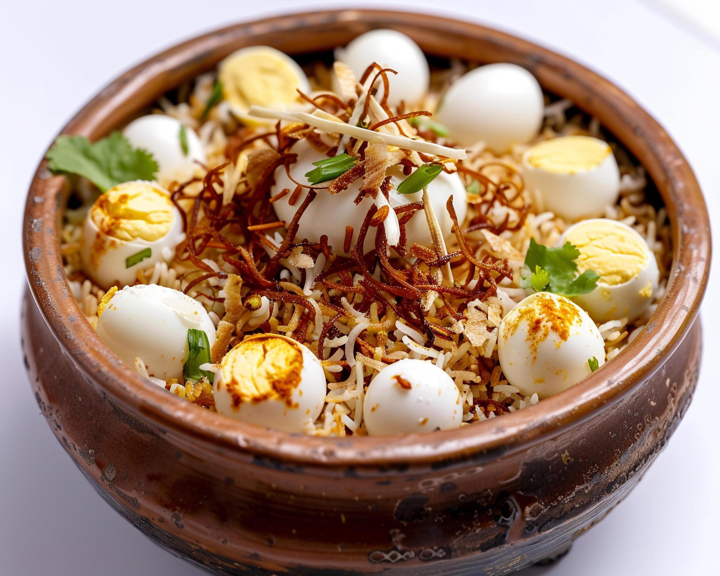 a bowl of rice with eggs and herbs Stock Free