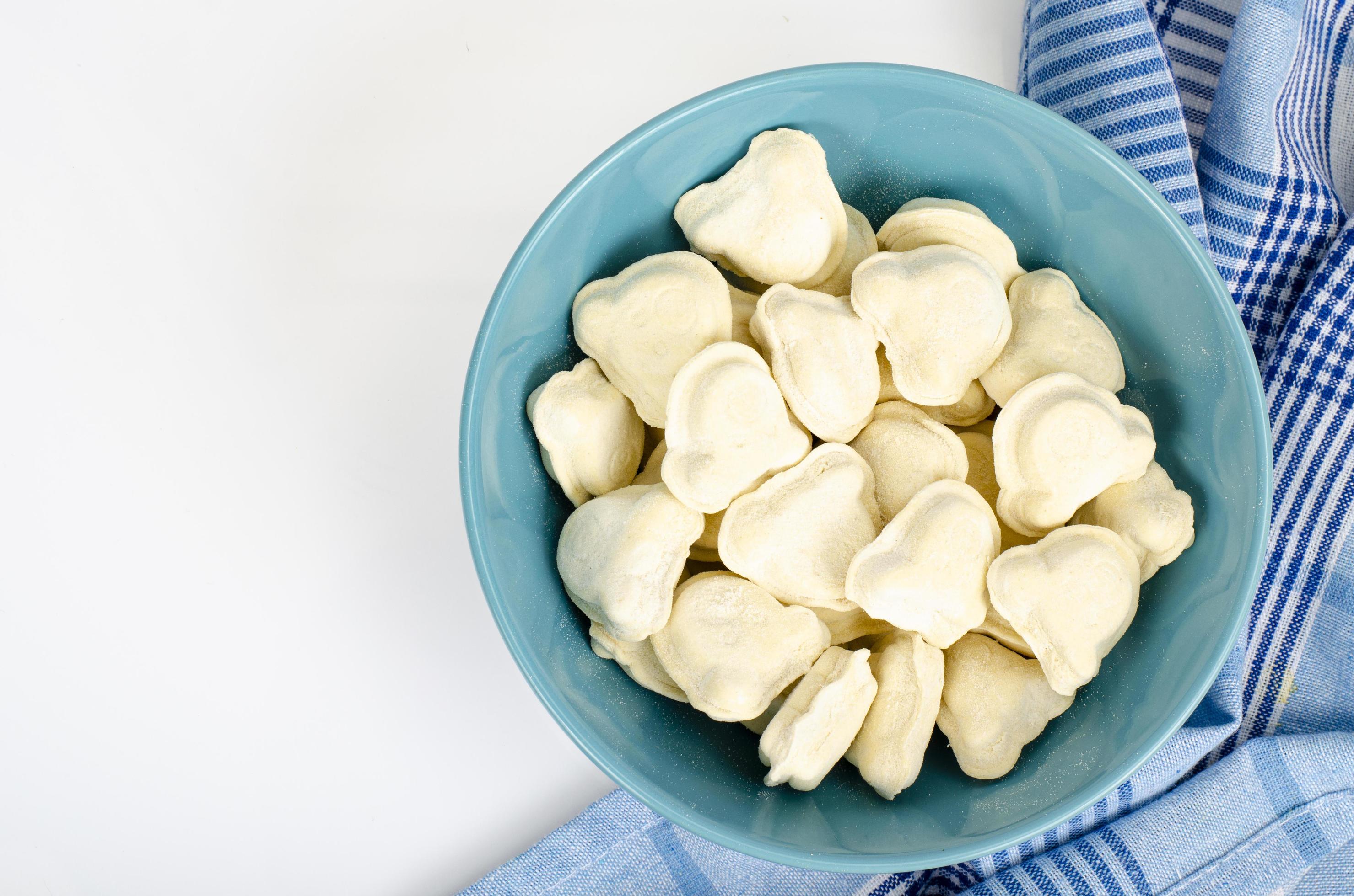 Raw dumplings with organic meat for baby food. Studio Photo Stock Free