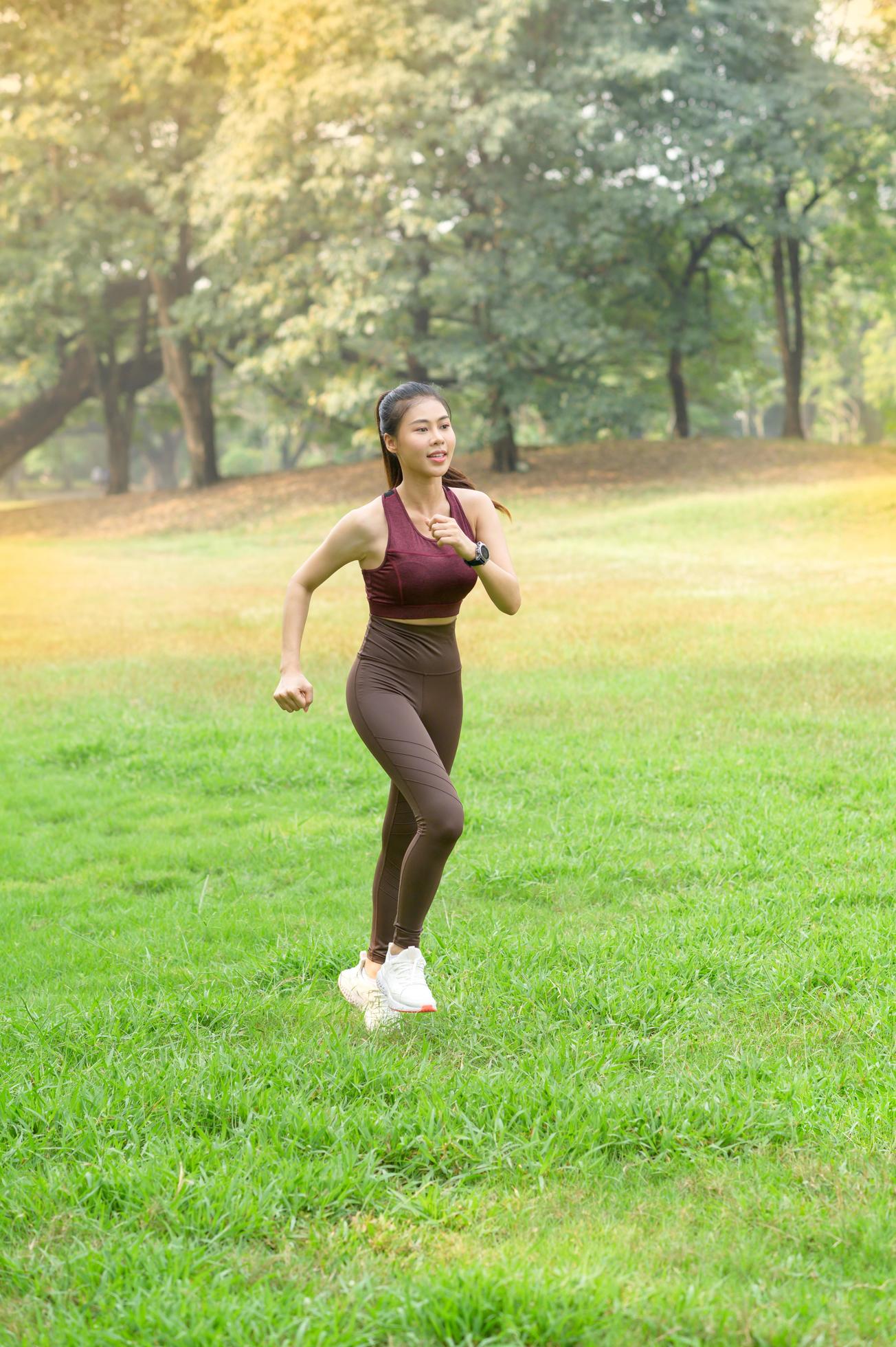 Beautiful Asian women exercise in the park every morning, It is a lifestyle for relaxation and good health of the body Stock Free