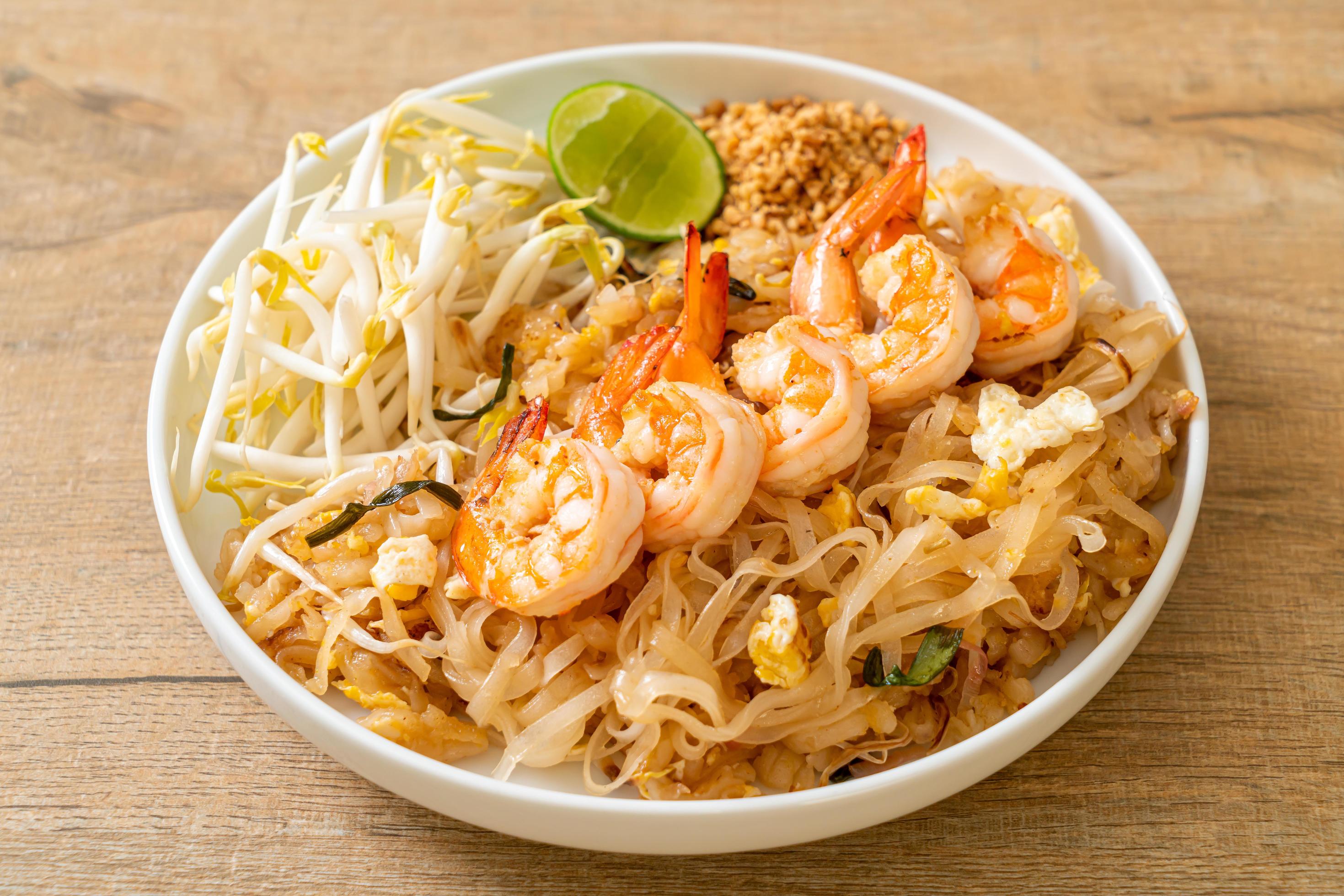 Stir-fried noodles with shrimp and sprouts or Pad Thai – Asian food style Stock Free