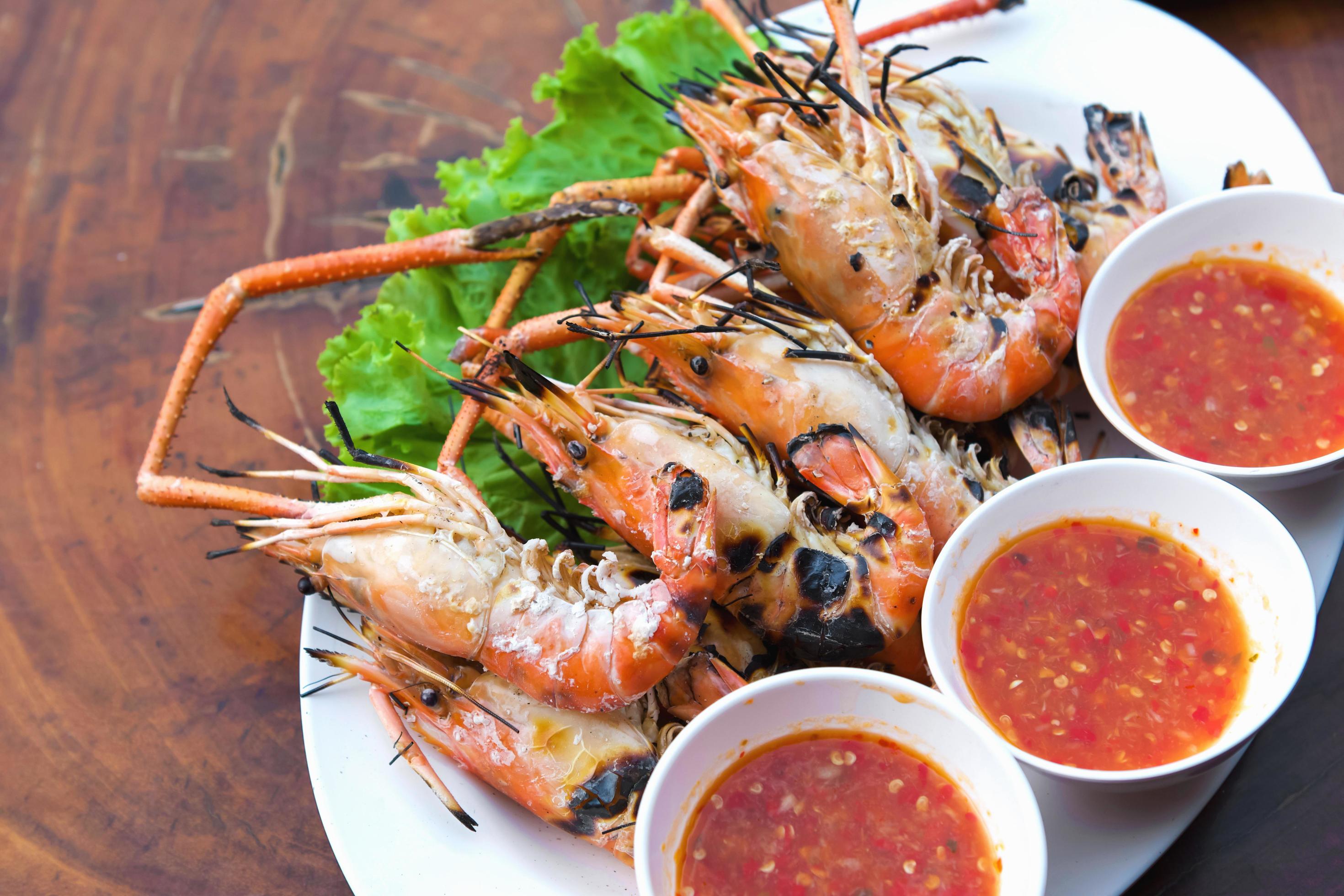 Burnt shrimp sea food on dish Stock Free