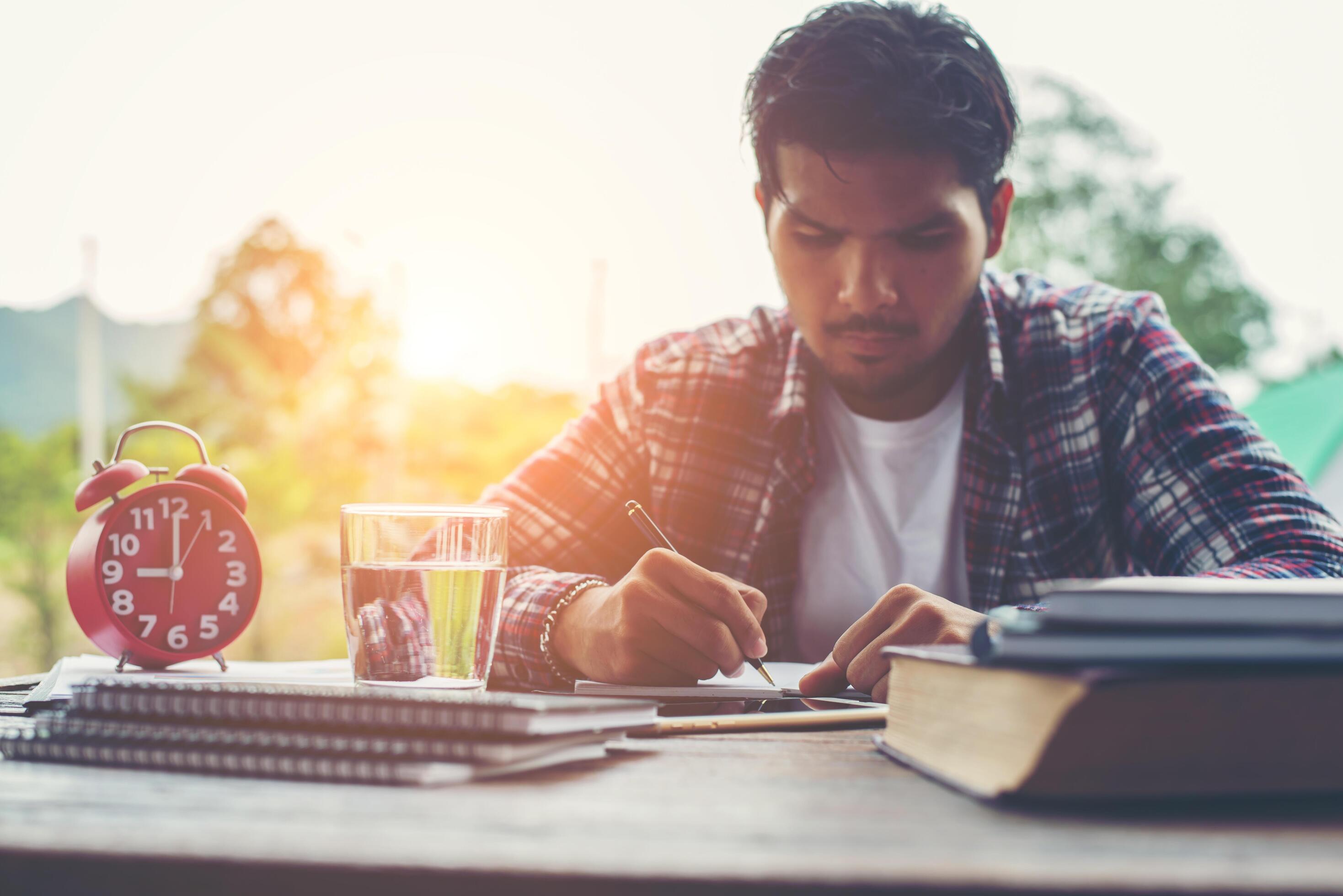 Hipster Businessman Working writing Determine Workspace Lifestyle Concept. Stock Free