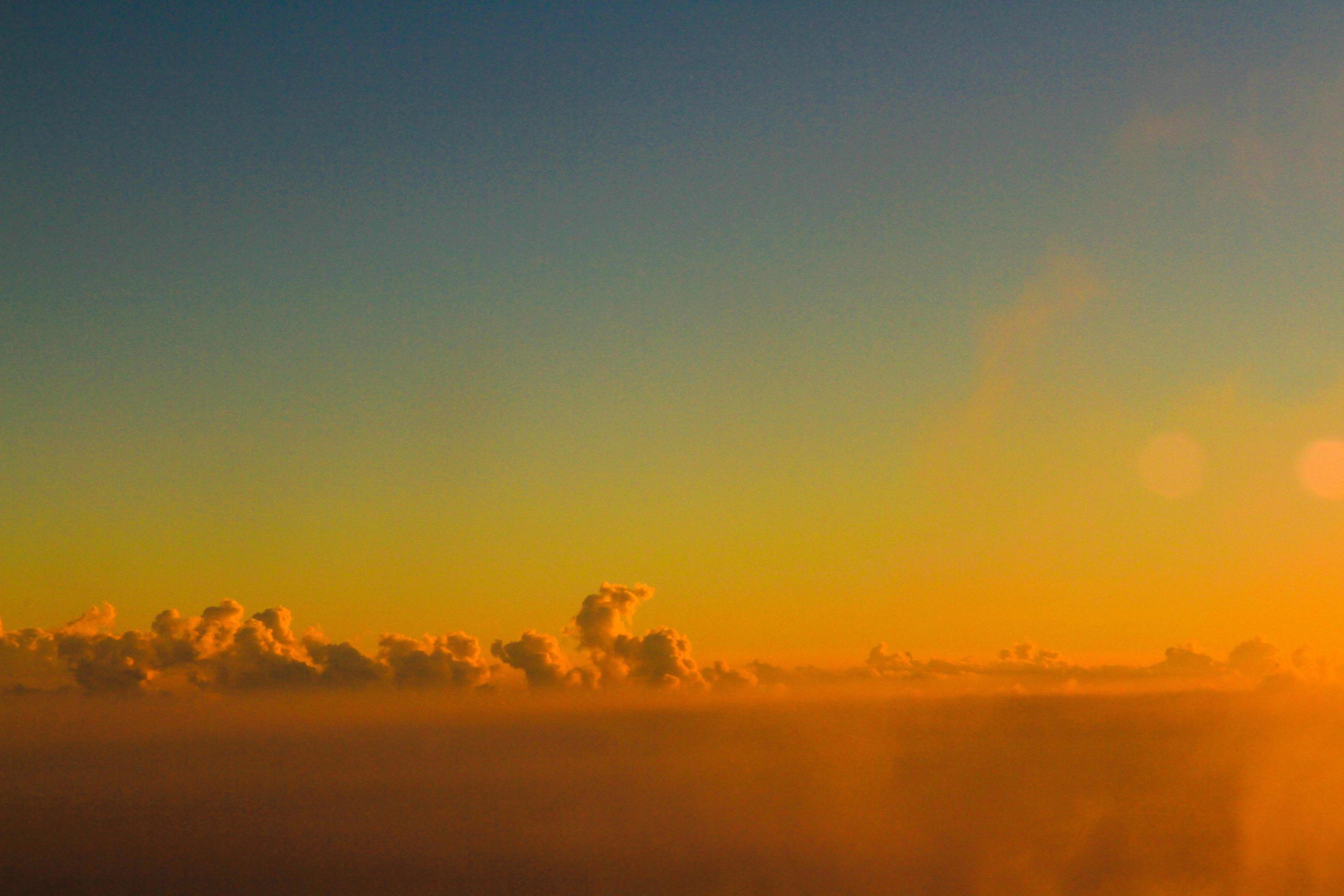 Golden light with sunrise in morning on the sky and clound .Fog cover the jungle hill in Thailand Stock Free