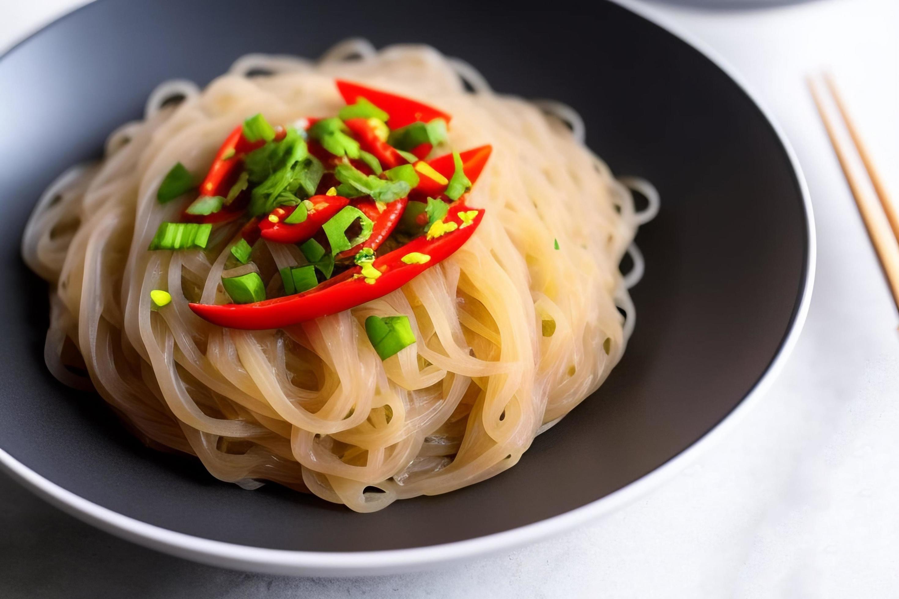 Delicious noodles. Fast food meal with appetizing pasta and chopsticks. Stock Free