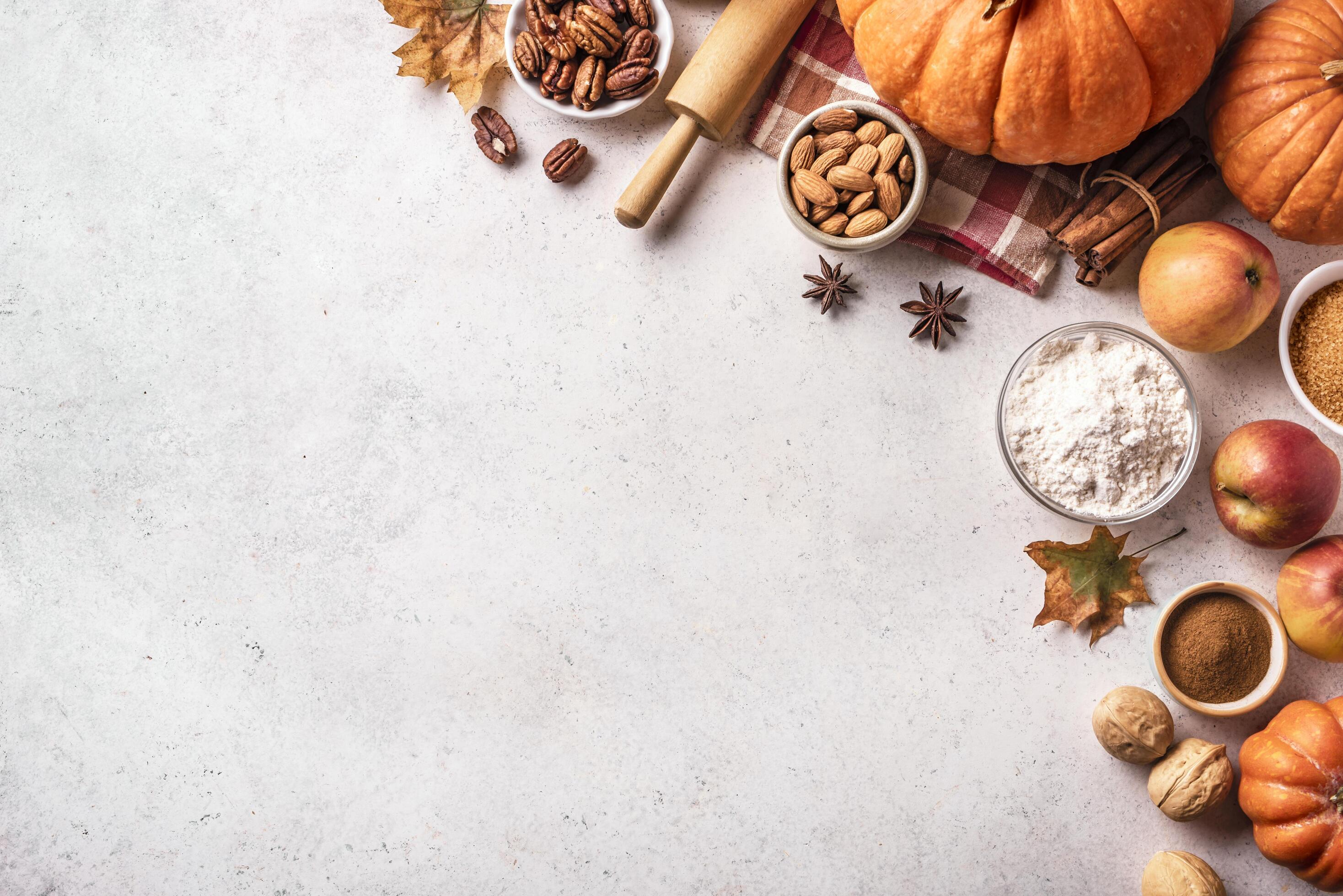 Autumn baking background with pumpkins, apples and nuts Stock Free