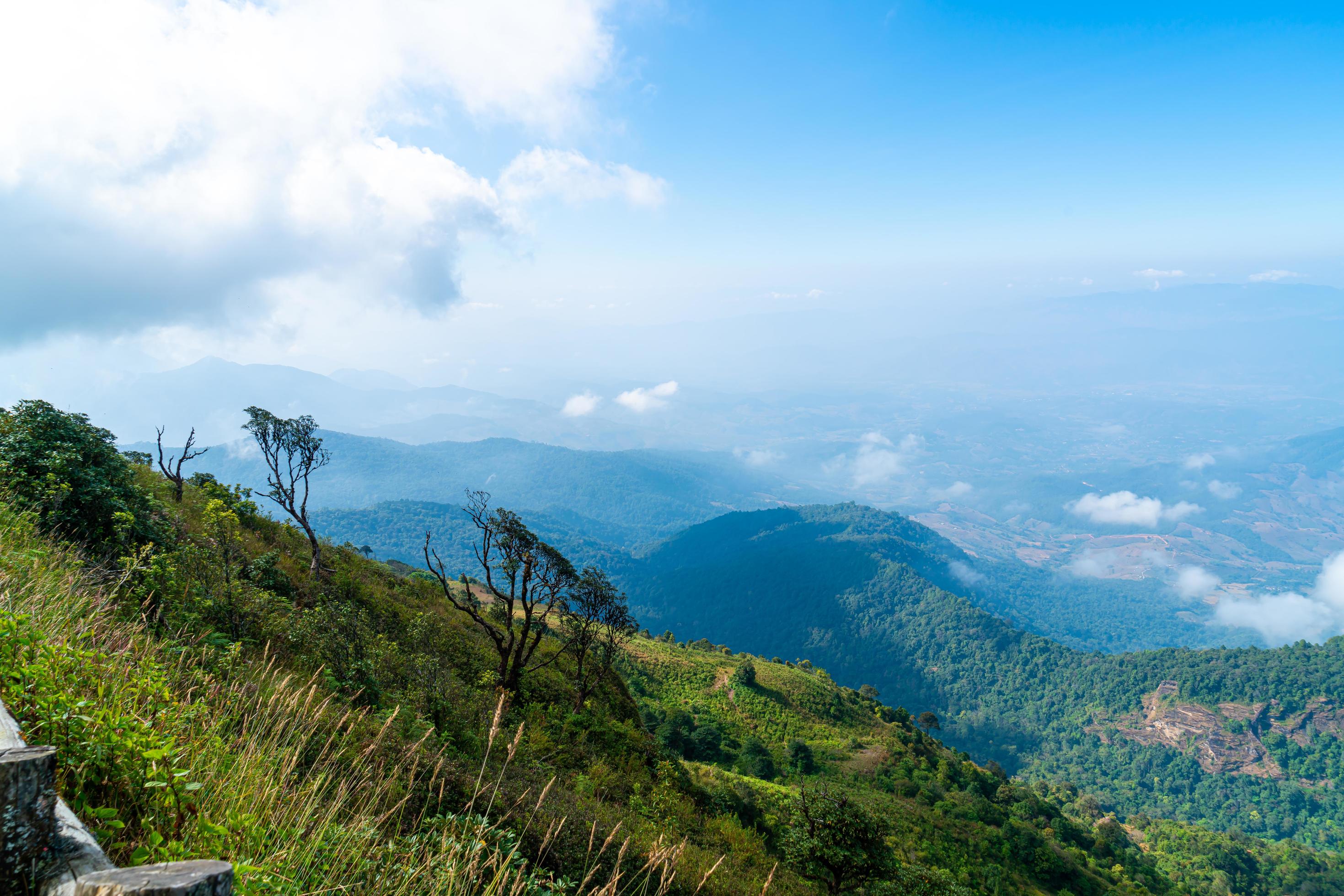 Beautiful mountain layer with clouds and blue sky at Kew Mae Pan Nature Trail in Chiang Mai, Thailand Stock Free