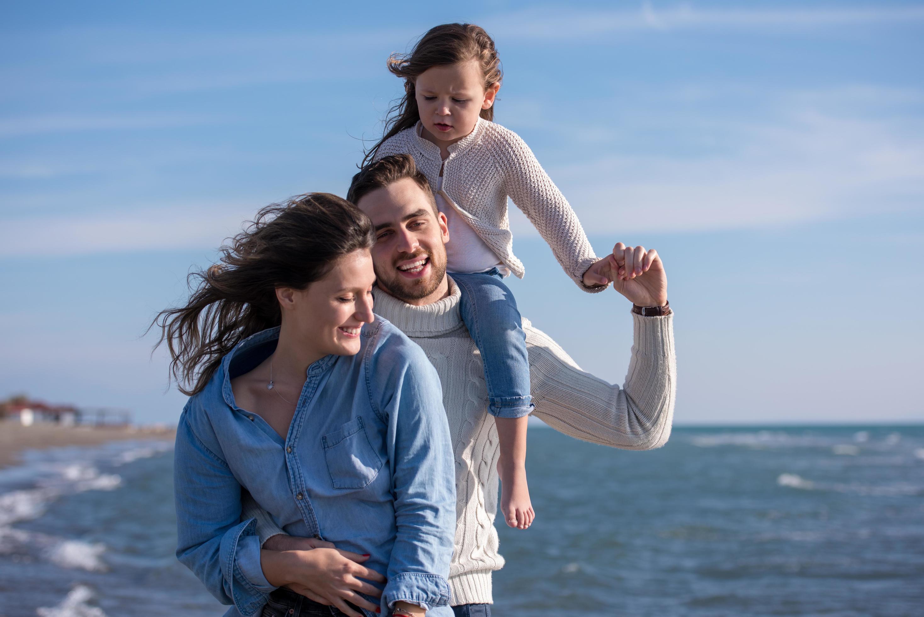 Young family enjoying vecation during autumn Stock Free