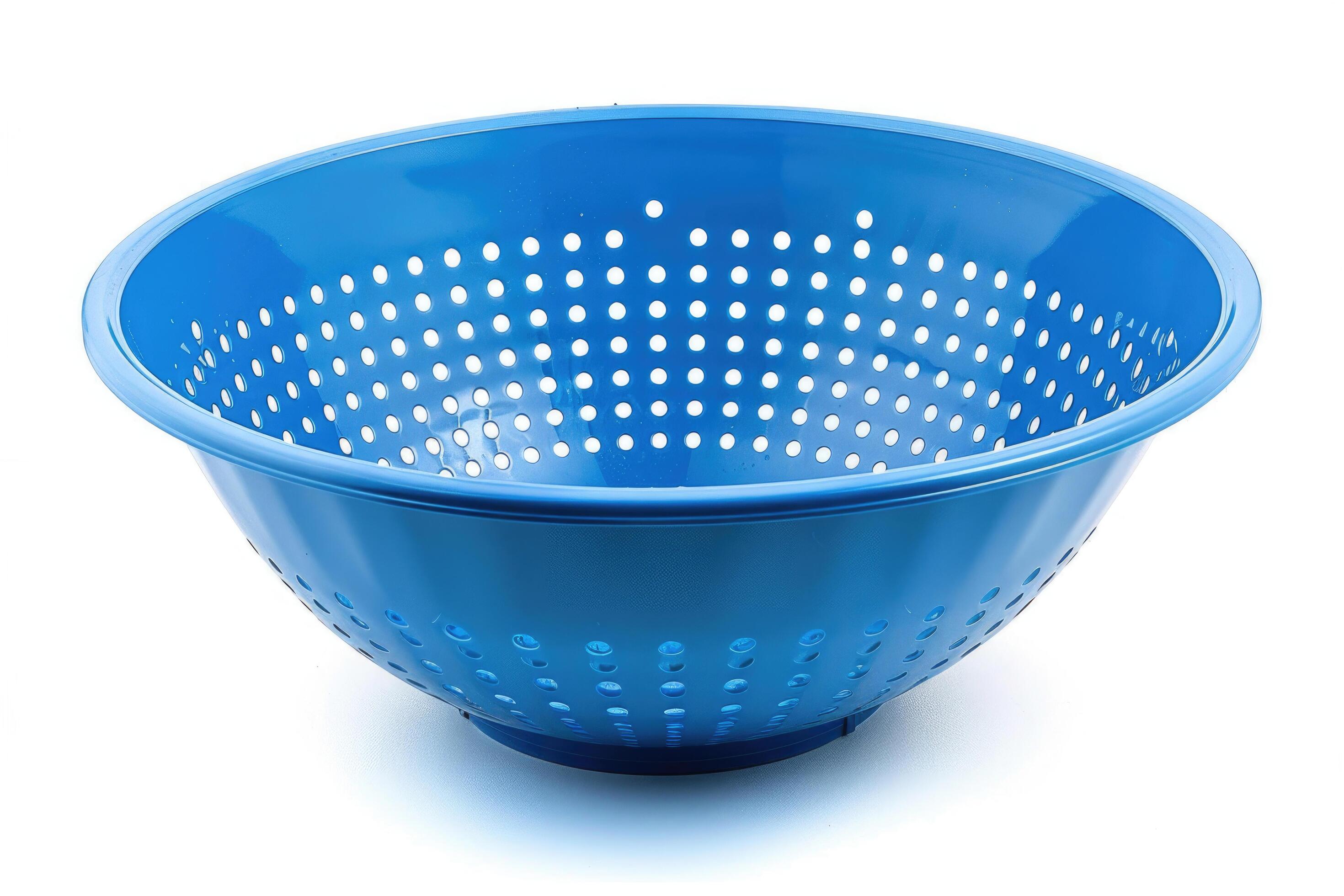 Blue plastic colander on a white background. Stock Free