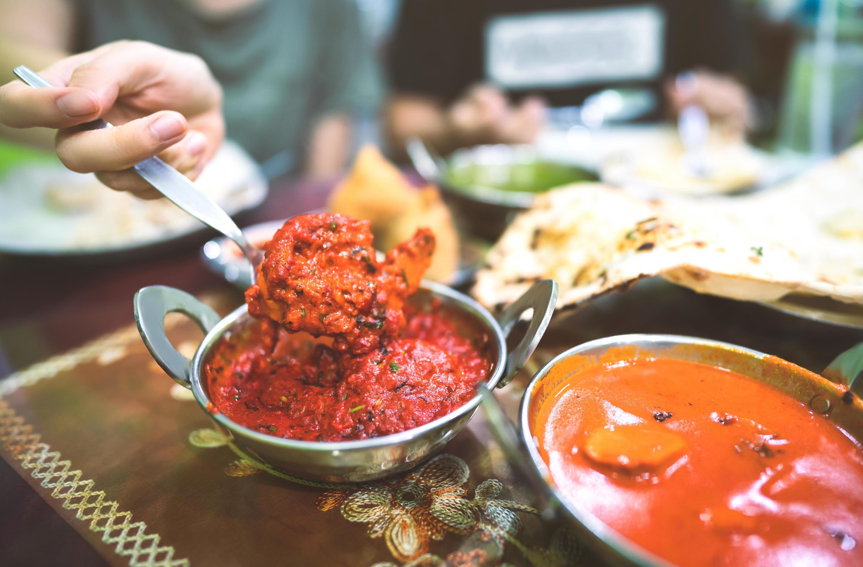 Couple have indian food meal. Stock Free