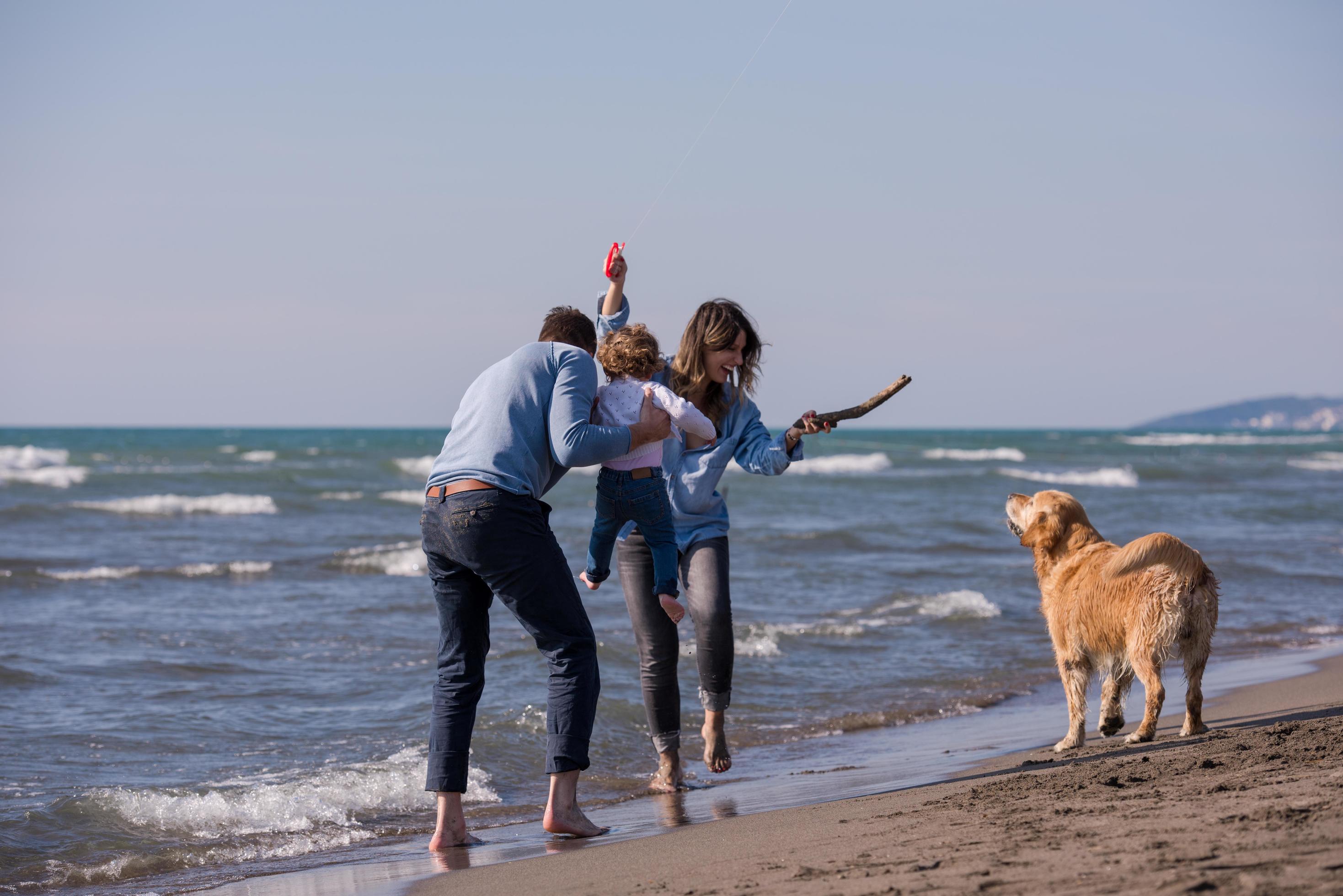 happy young family enjoying vecation during autumn day Stock Free