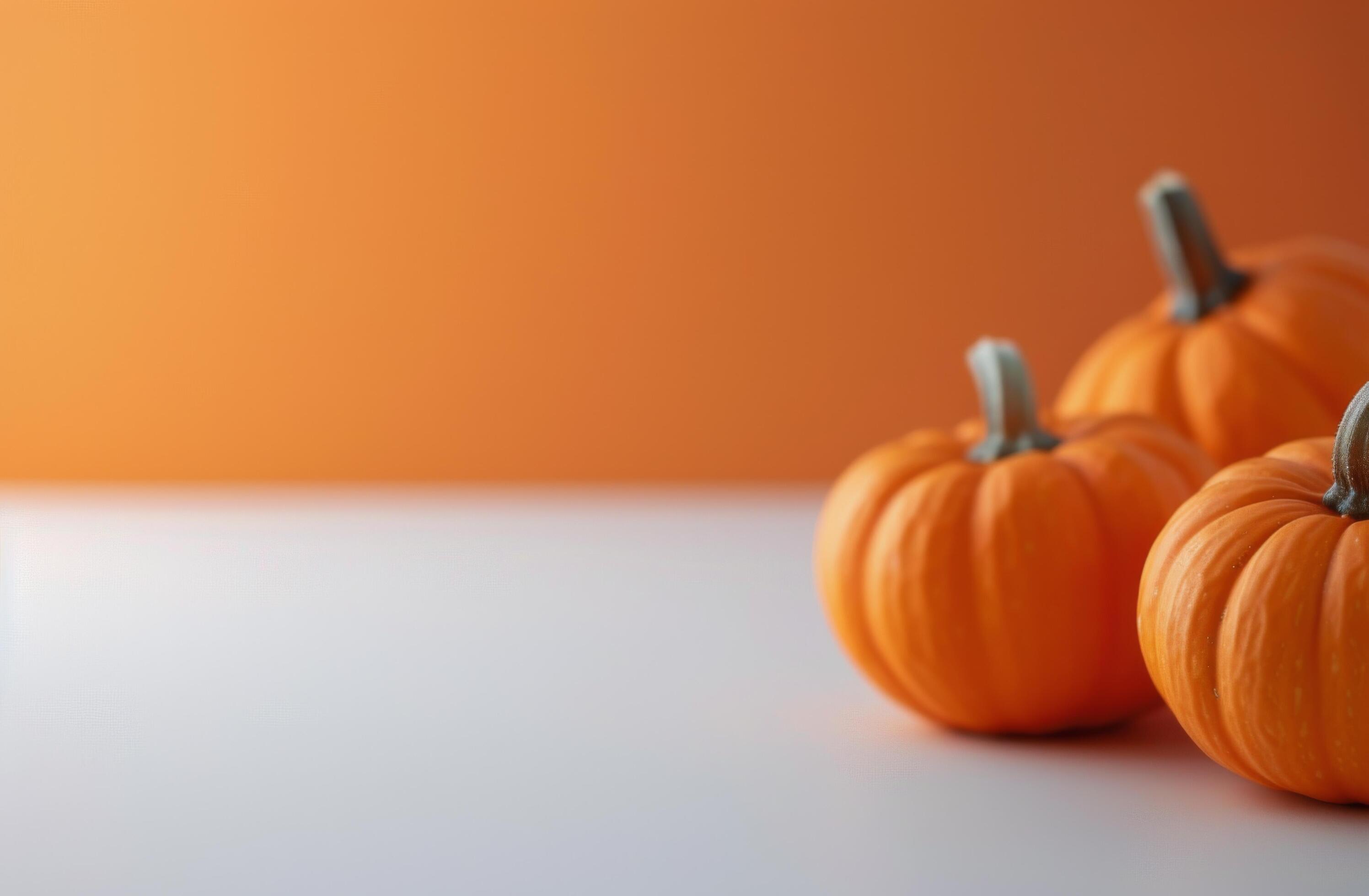 
									Vibrant Orange Pumpkin With Autumn Leaves on Warm Background Stock Free