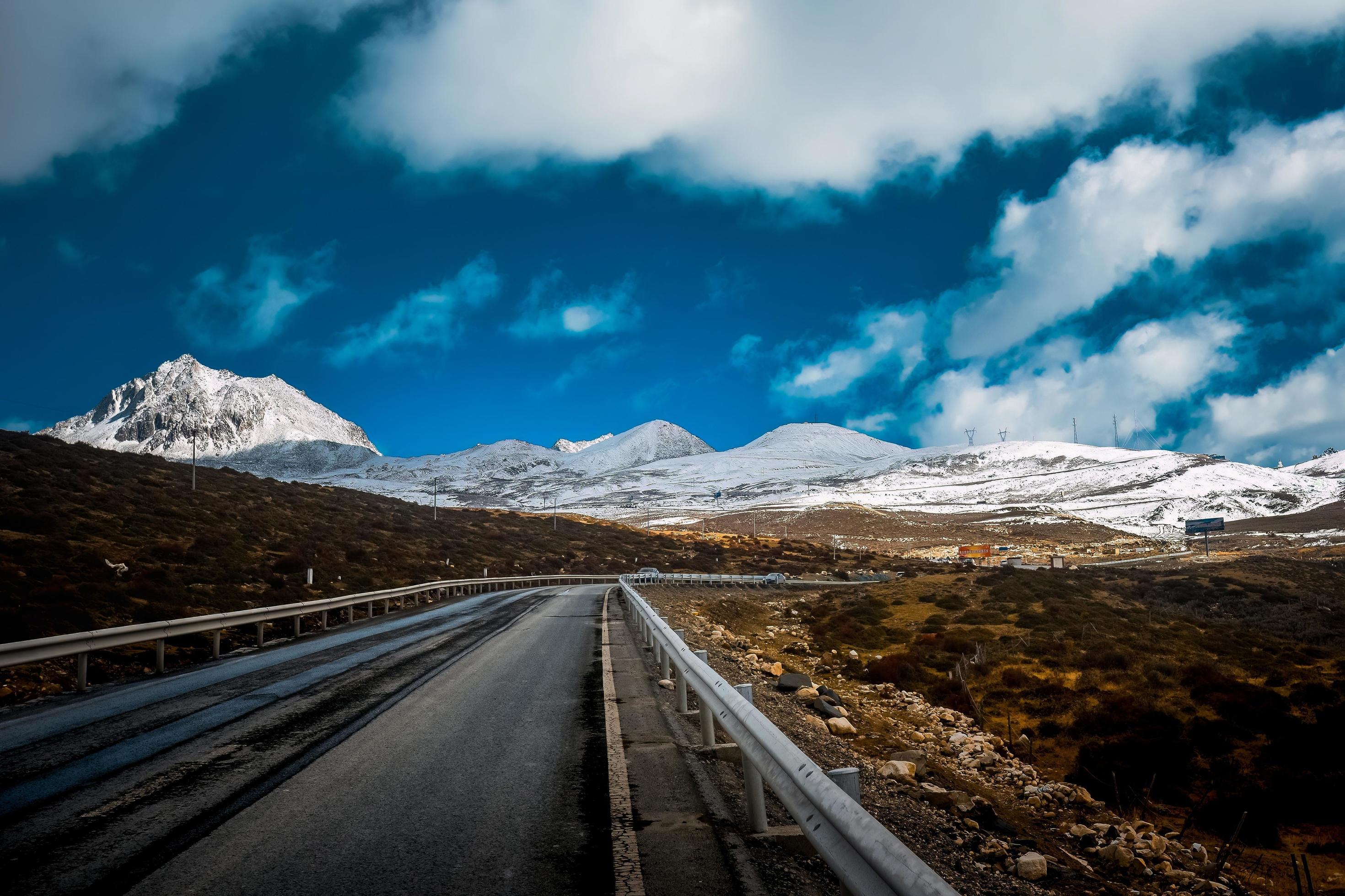 Spectacular scenery in the high mountains of western Sichuan, China, with different seasons Stock Free