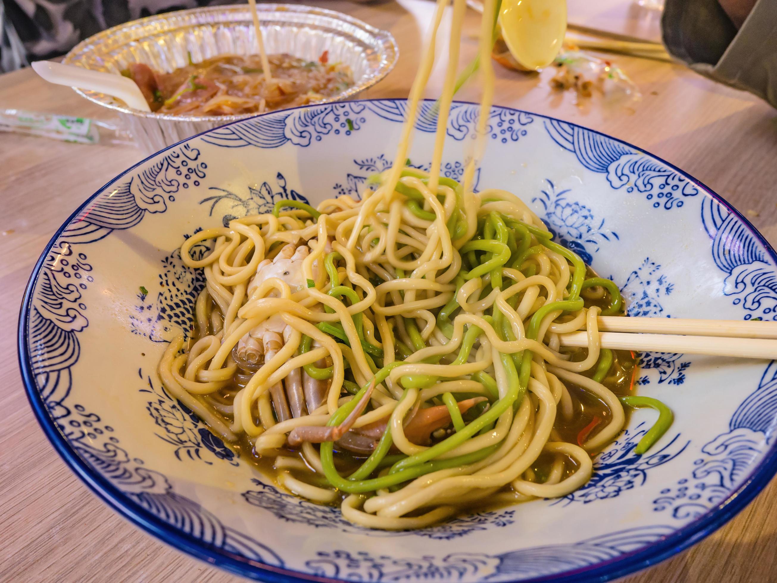 Close up Crab Noodle Street Food on Taiping old Street in the evening time at Changsha city hunan China Stock Free